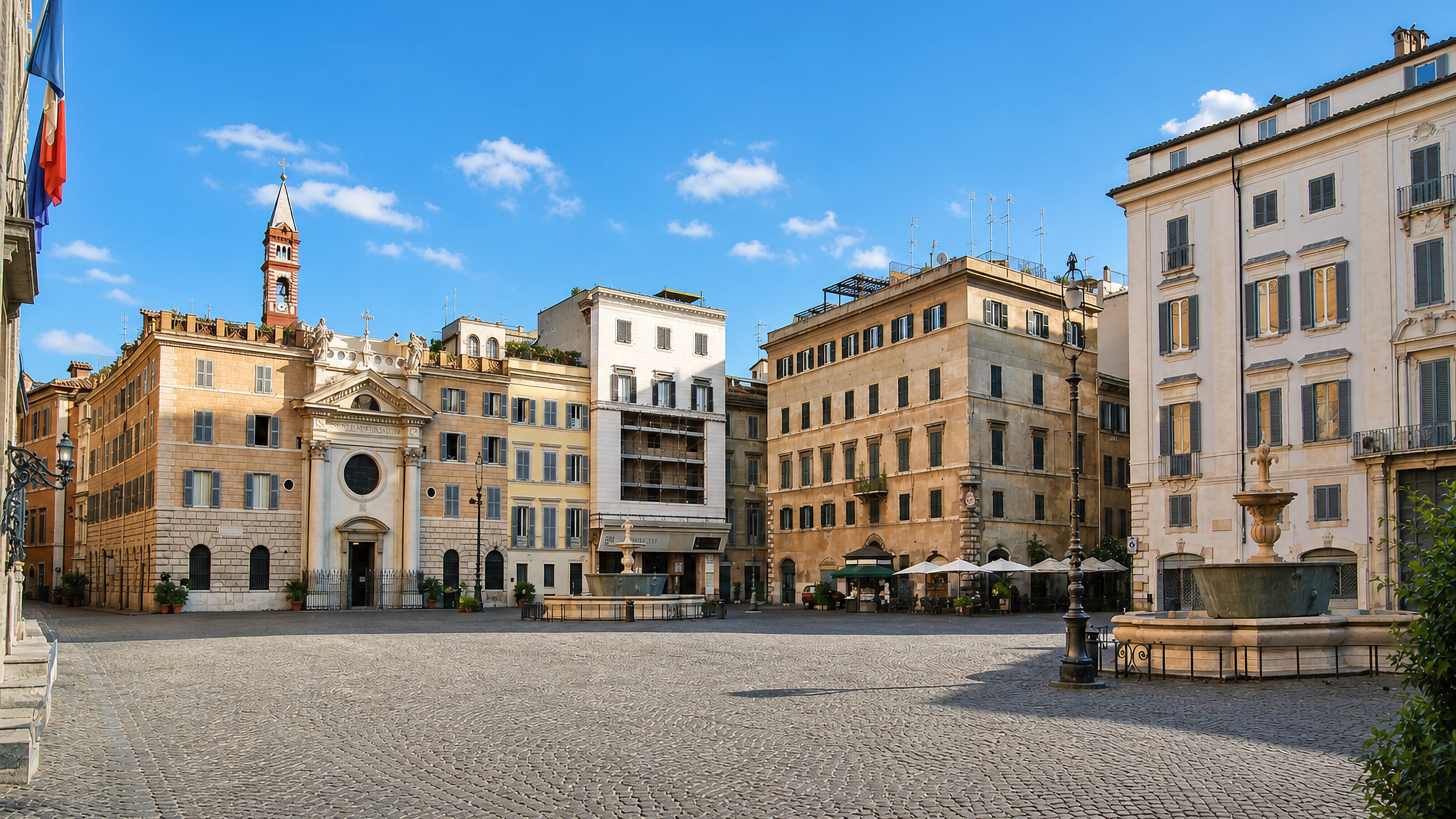 The cobbled Piazza Farnese in Rome's Regola rione, with its twin basin fountains and the Santa Brigida church