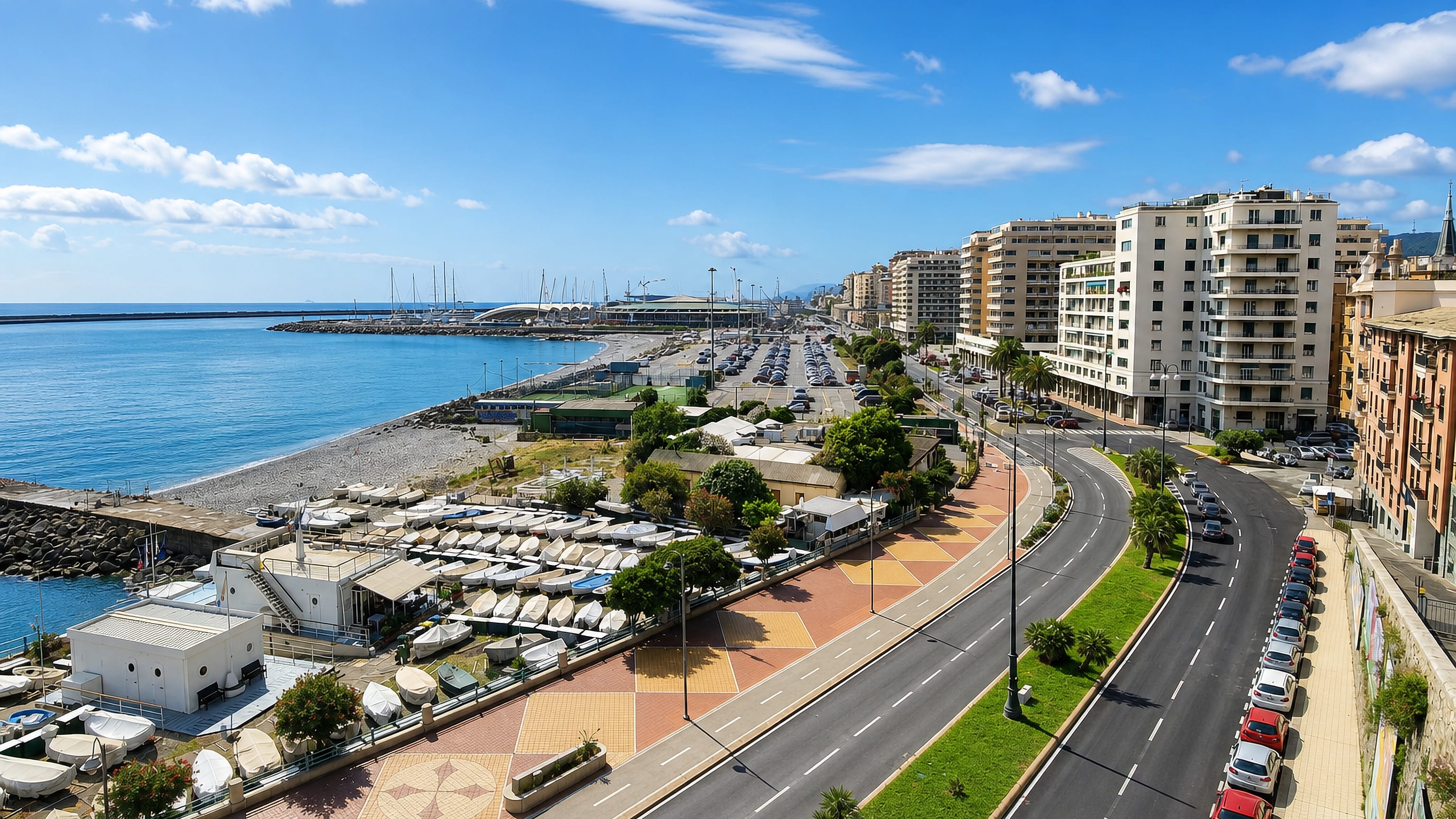 Corso Italia seafront curving past the marina, beach and apartment blocks in Genoa's Foce district