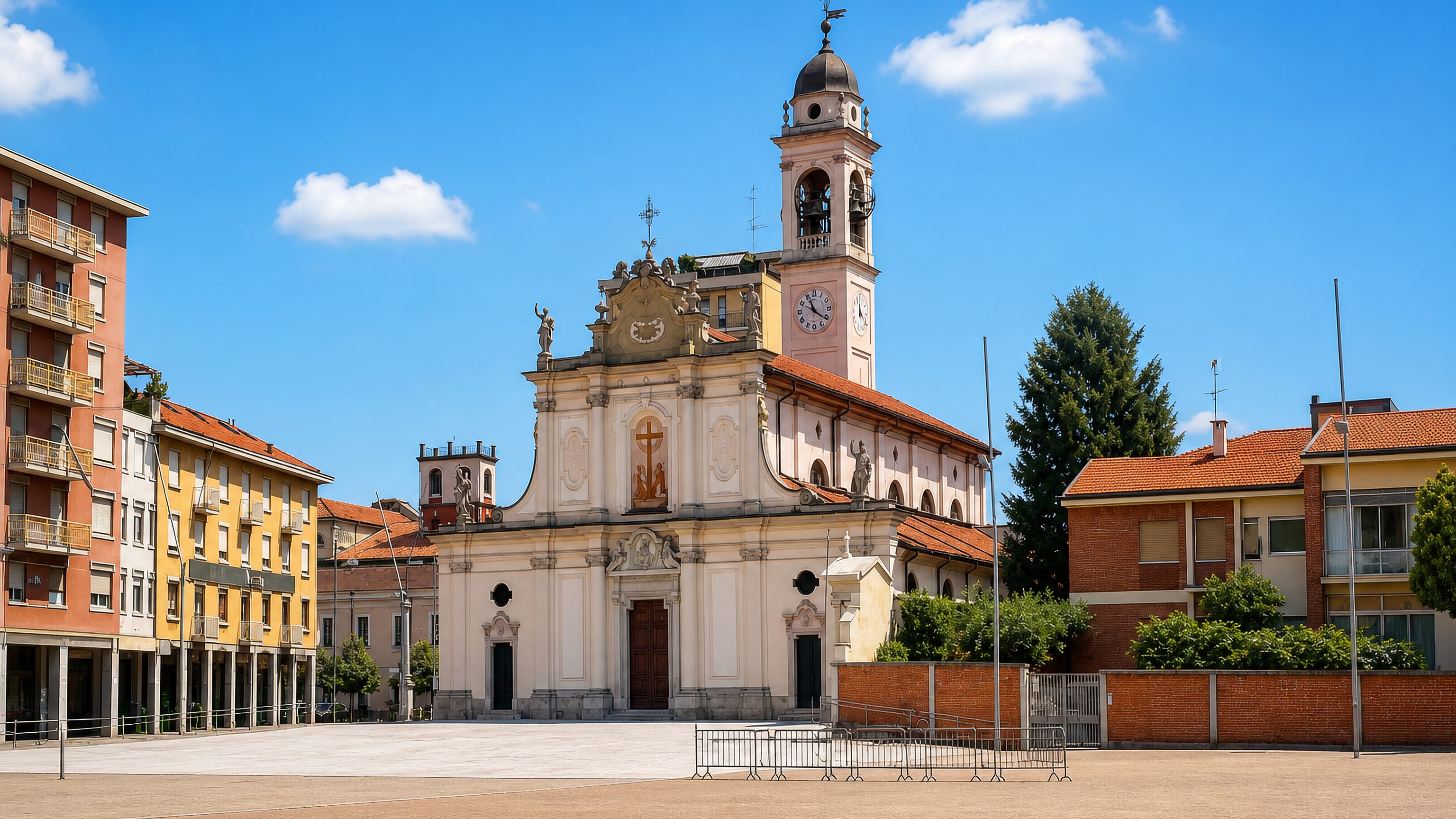 The Baroque parish church and pink bell tower on the main piazza of Cinisello Balsamo, Lombardy