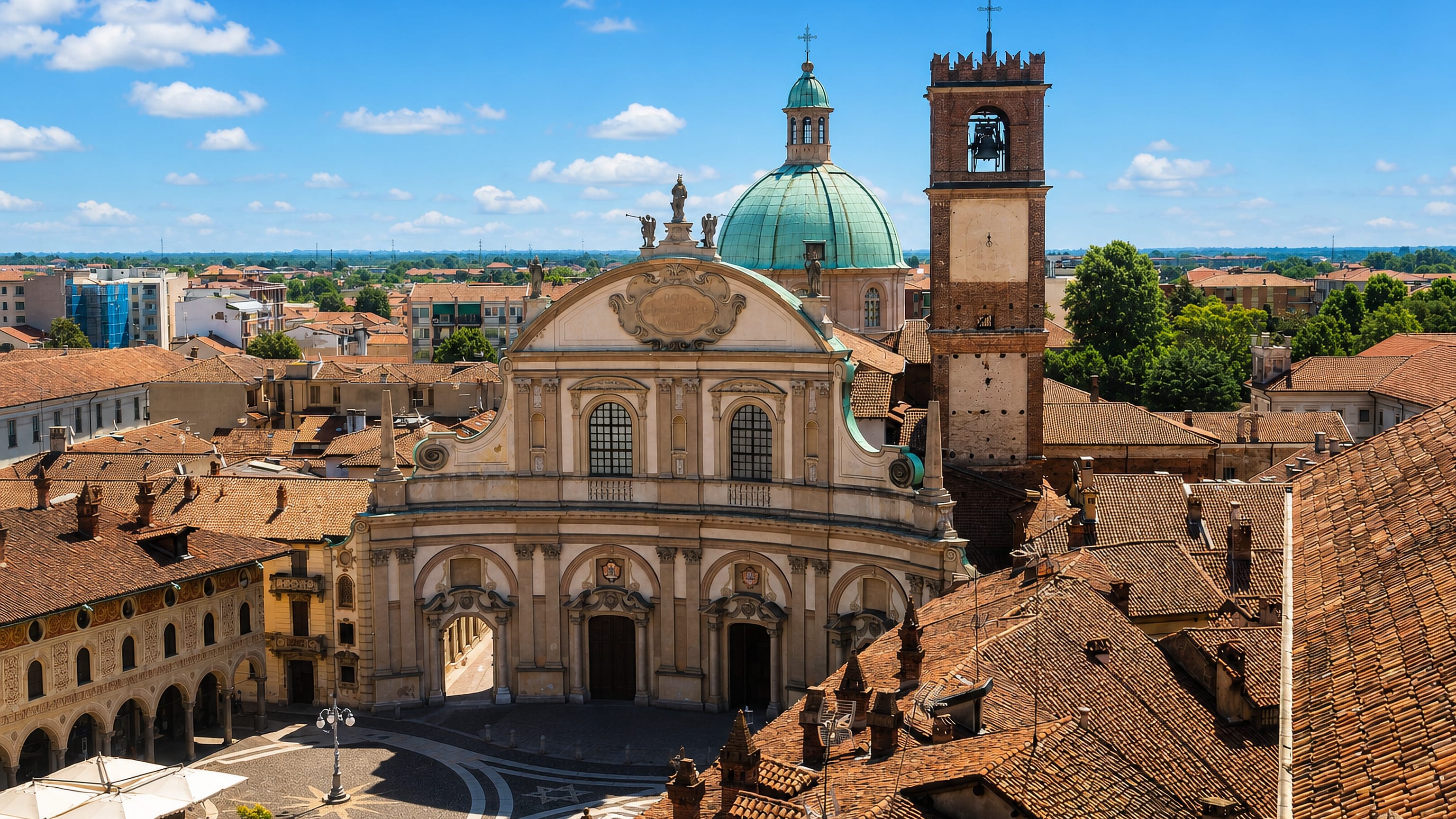 Vigevano's Piazza Ducale with the cathedral's curved Baroque facade and the brick Bramante tower.