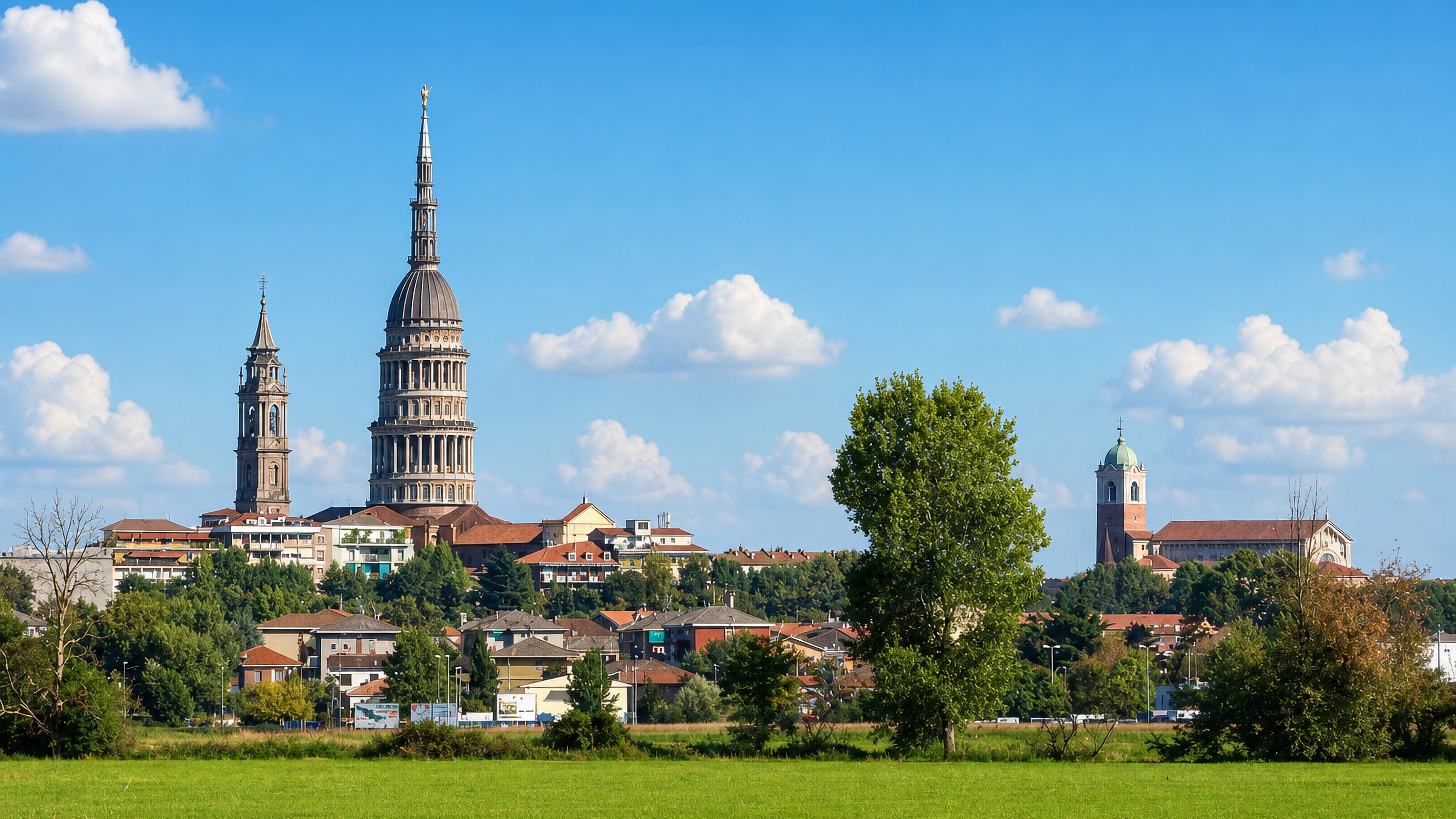 Novara skyline across the Piedmont plain, dominated by the Antonelli dome and bell tower of San Gaudenzio.