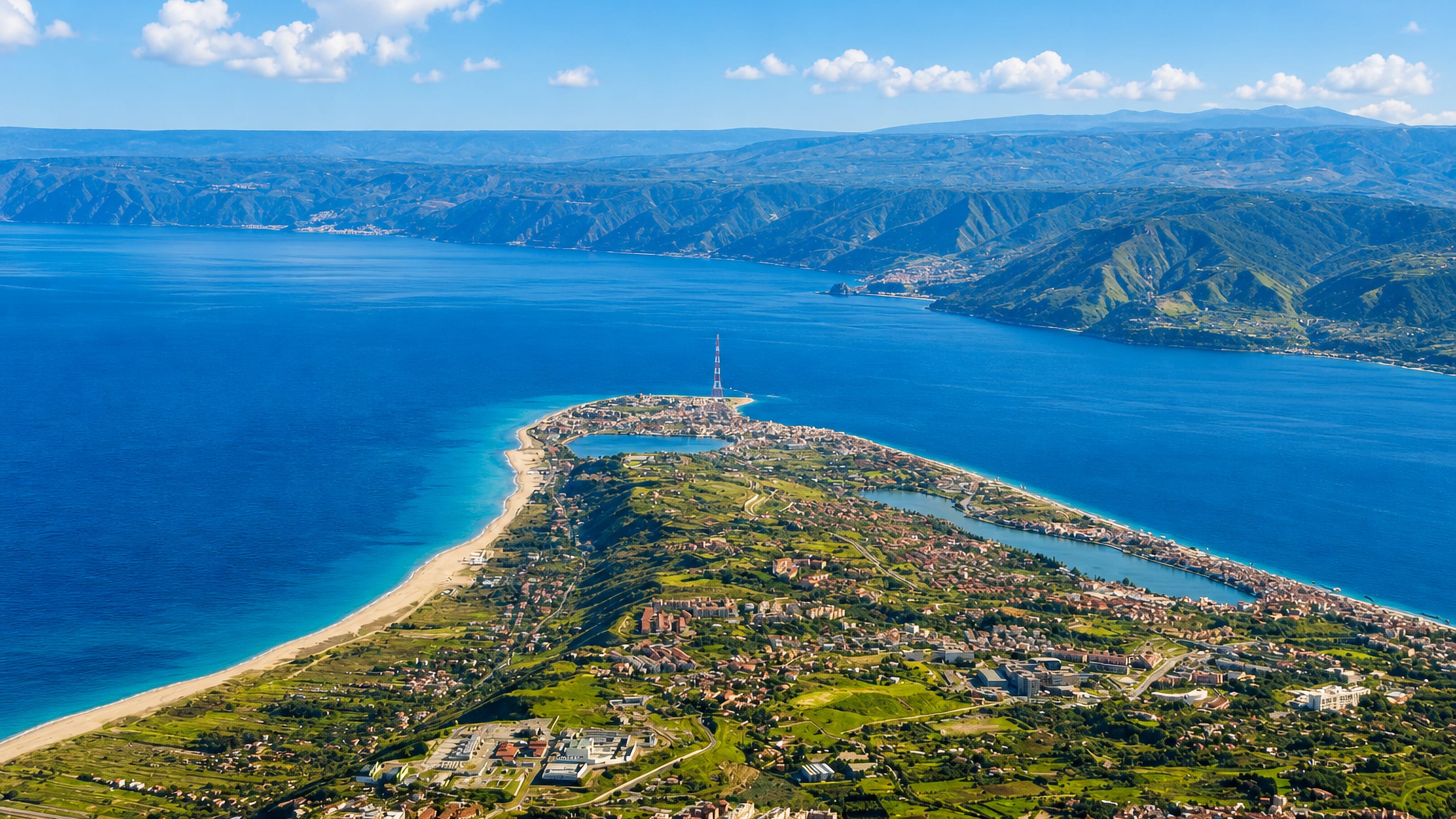 Ganzirri's lagoons and the Torre Faro pylon on the tip of Messina's peninsula across the Strait