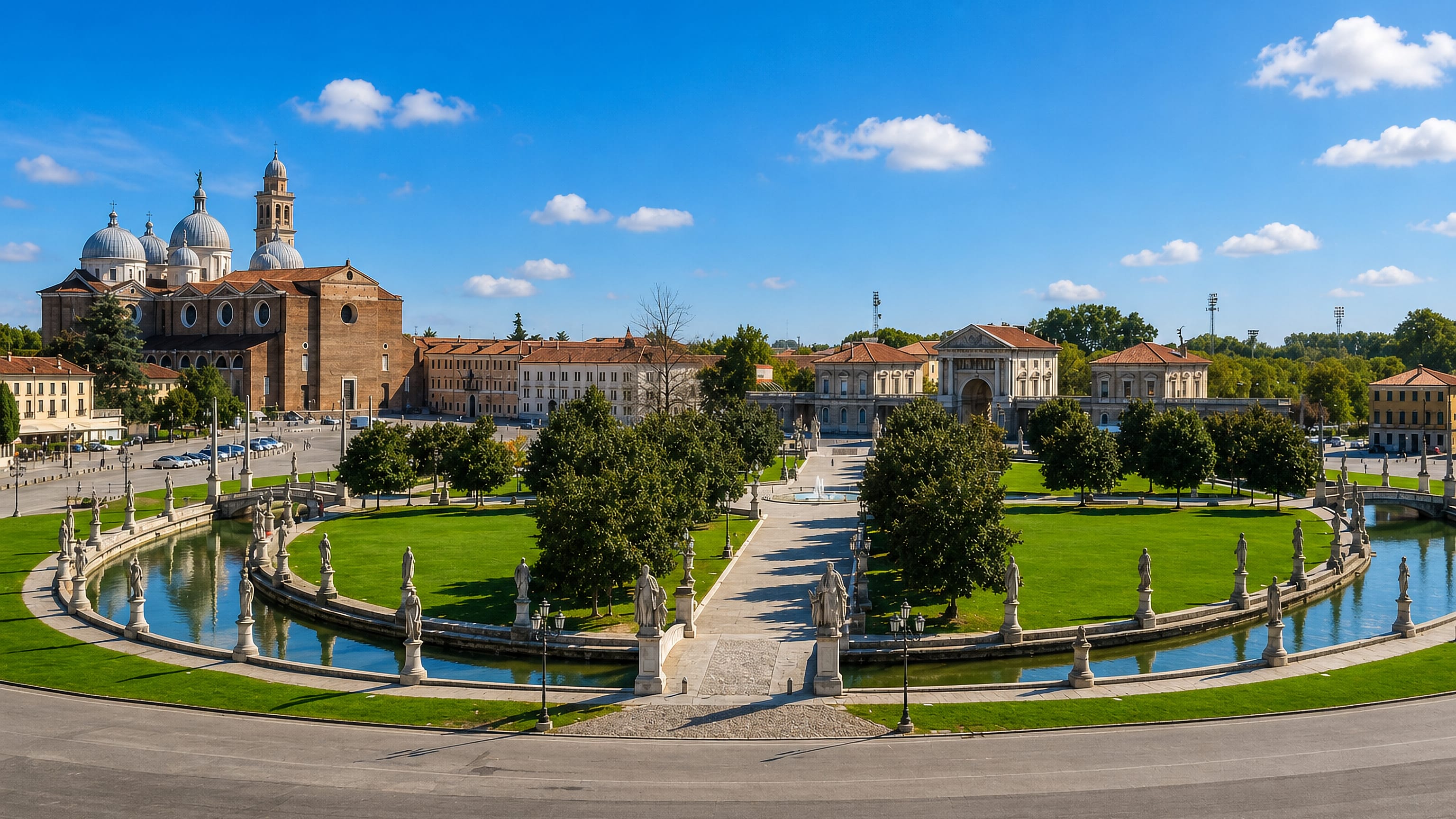 Padua's Prato della Valle, its statue-lined canal ring and lawns fronting the domes of Santa Giustina basilica