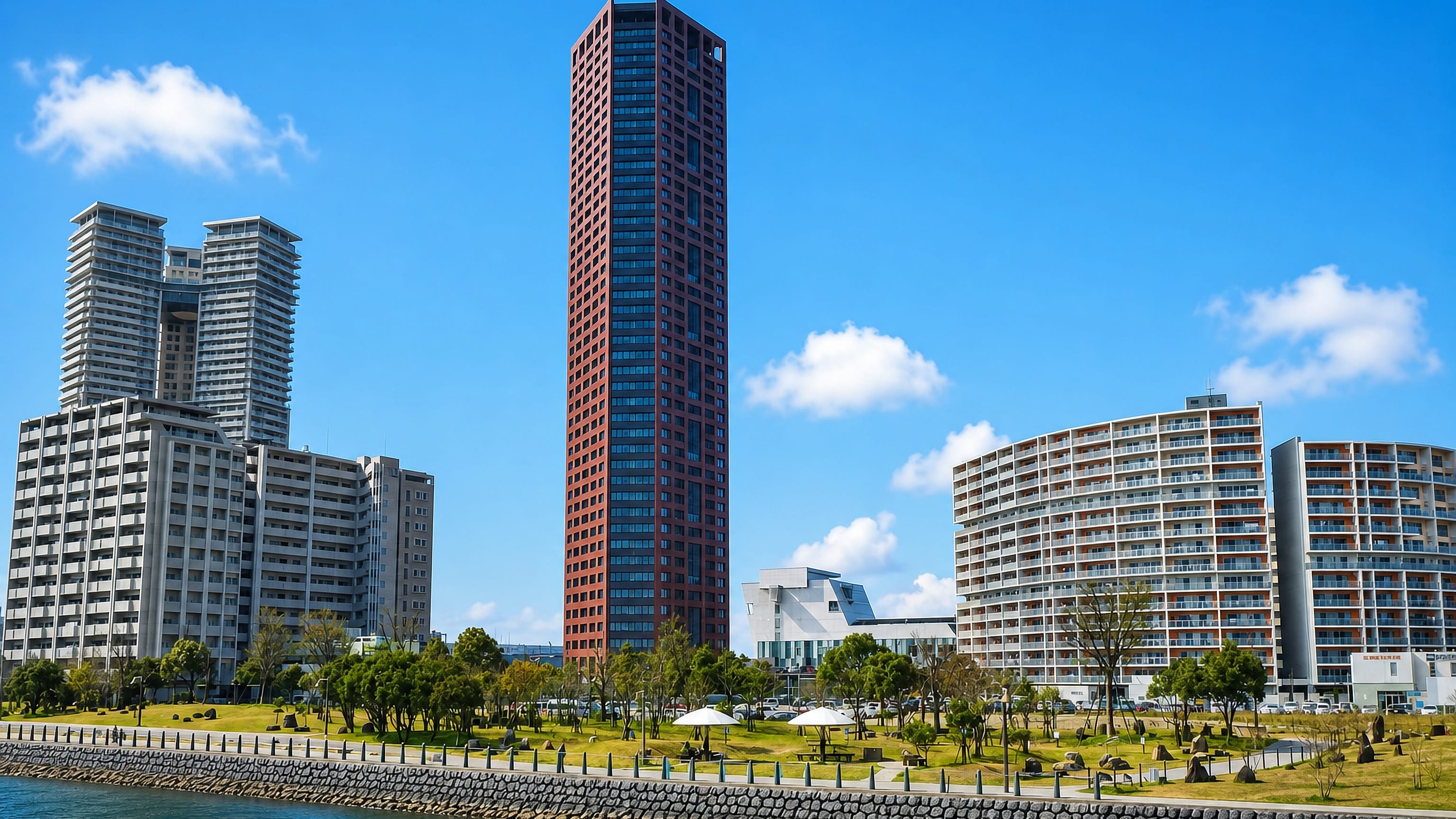 Waterfront high-rise towers and a seafront park on the reclaimed island district of Kashii-teriha, Fukuoka.