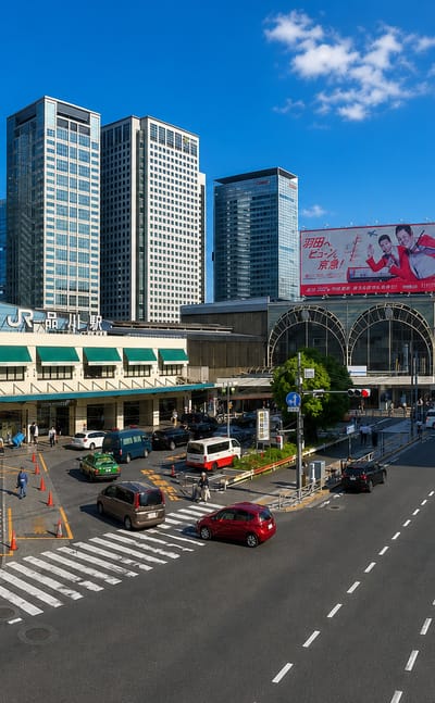 JR Shinagawa Station plaza in Tokyo with the LUMINE building and glass office towers behind.