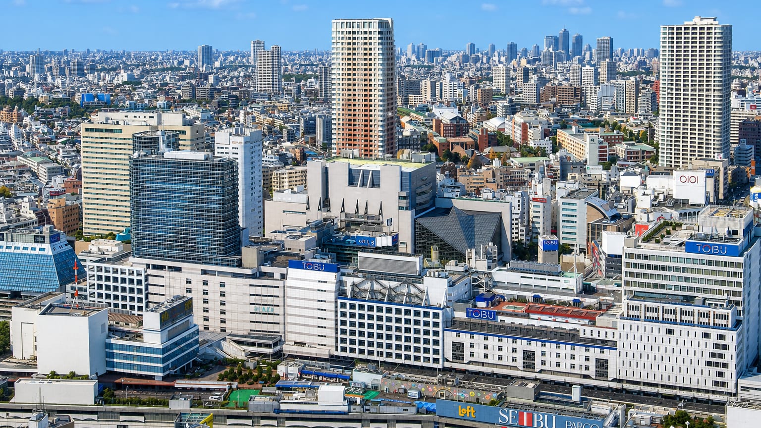 Ikebukuro in Tokyo's Toshima ward with the Seibu, Parco and Tobu department-store complexes and towers.