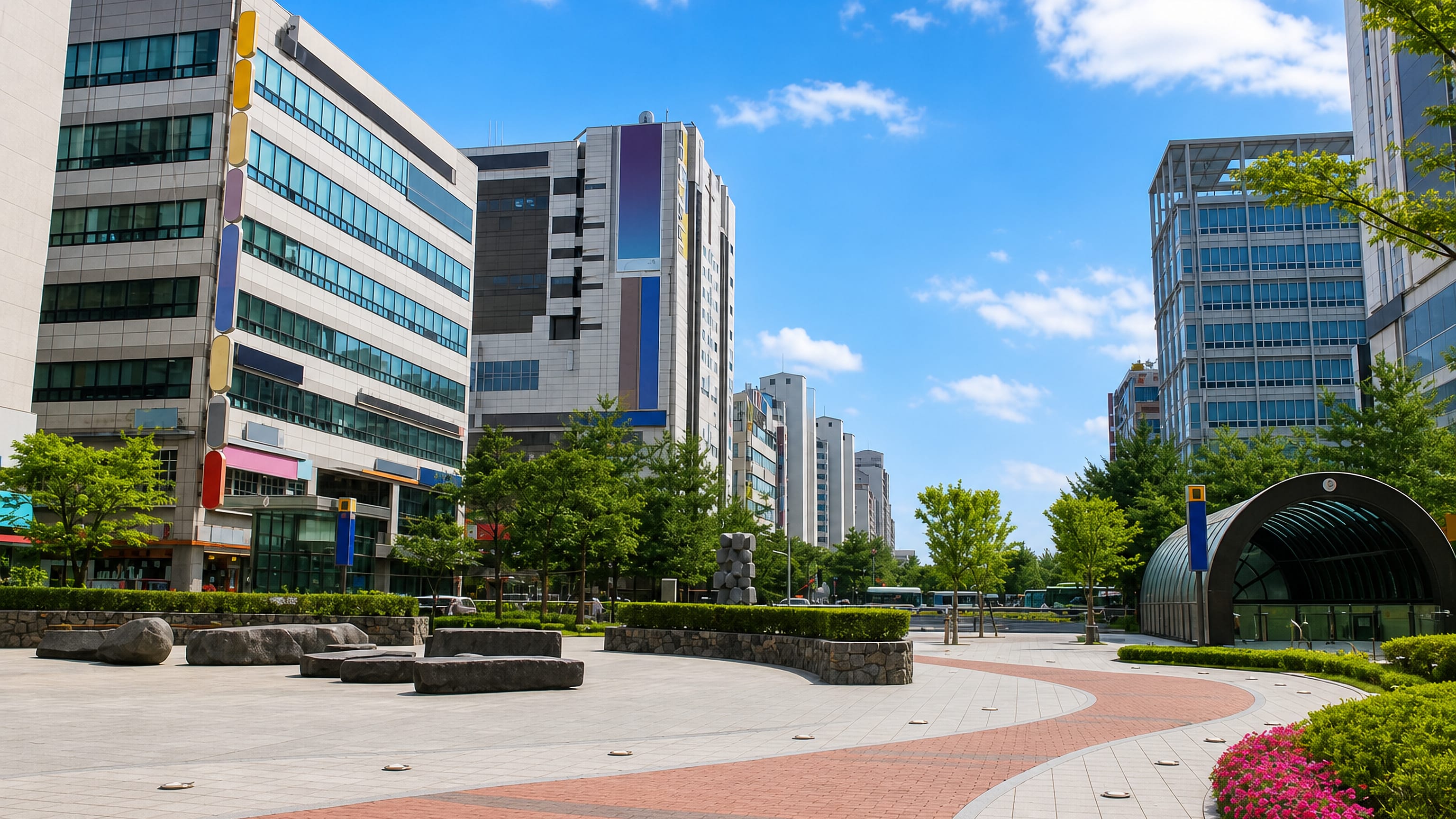 Paved plaza and subway entrance among mid-rise buildings in Ilsandong, Goyang's Ilsan new town.