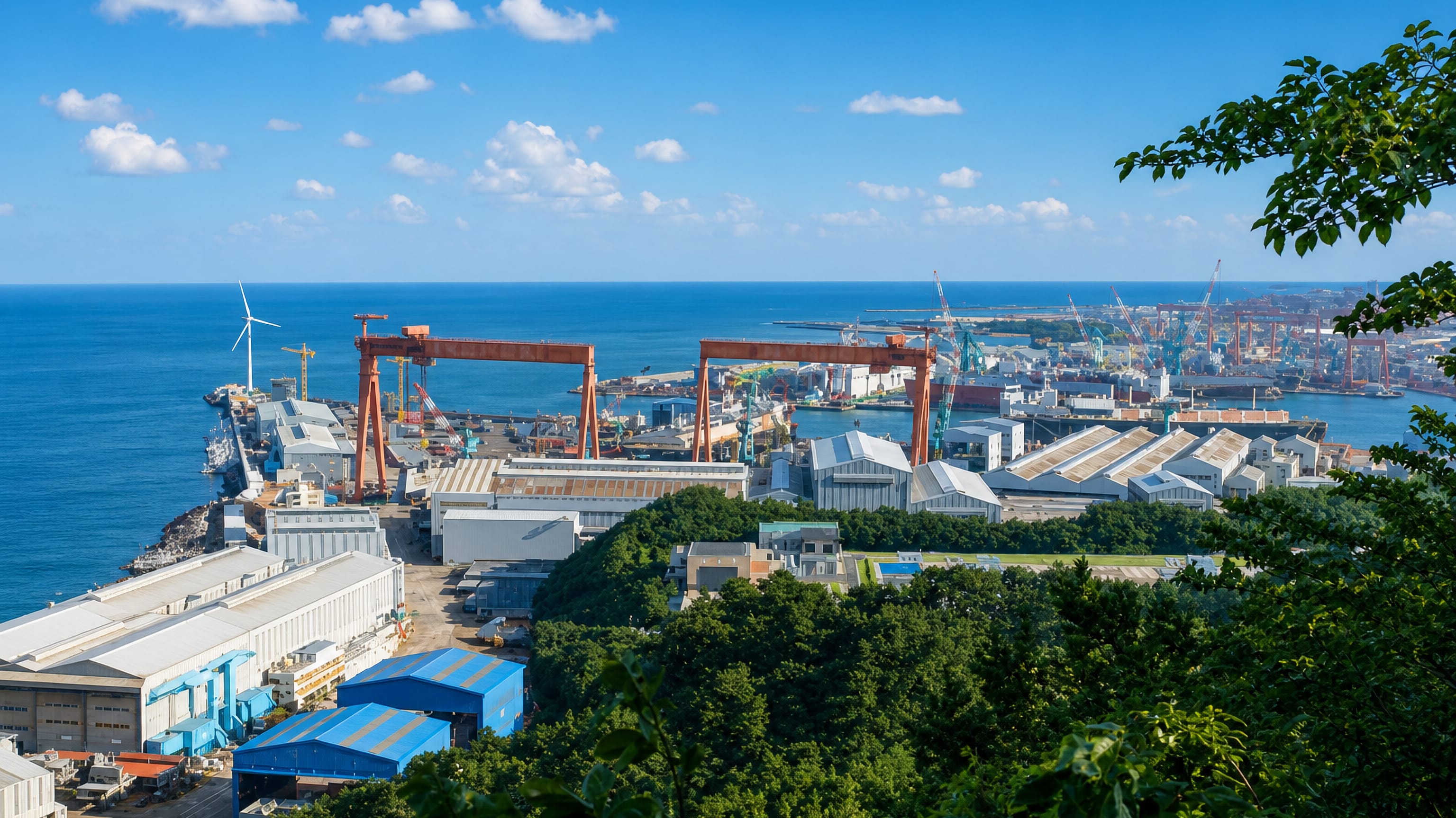Ulsan's shipyard with orange goliath gantry cranes along the bay, seen from a wooded hillside above the coast.