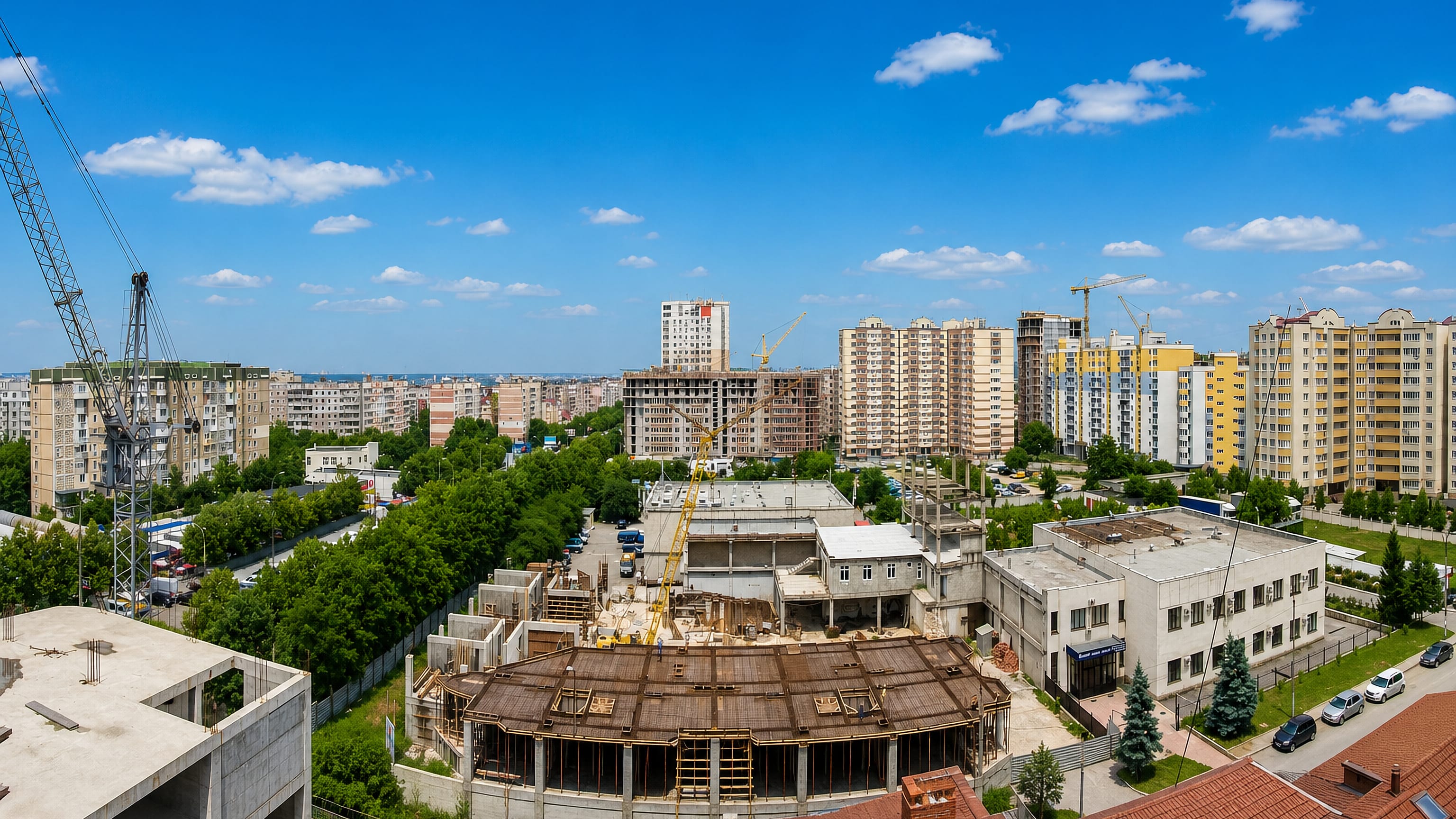 Apartment blocks and new construction rising over the Buiucani district of Chisinau.