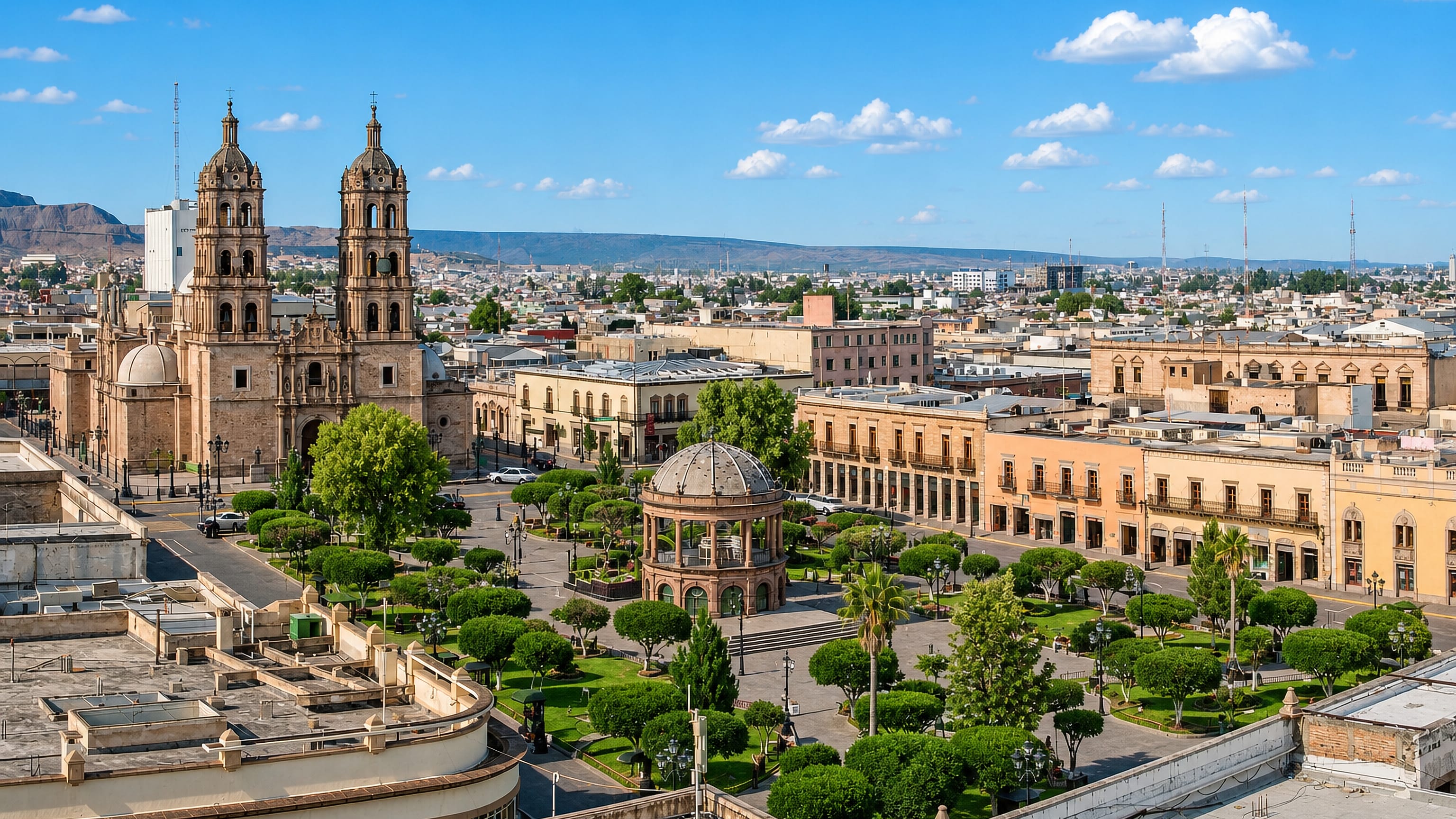 Durango Cathedral's twin baroque towers above the Plaza de Armas bandstand in Victoria de Durango, Mexico.