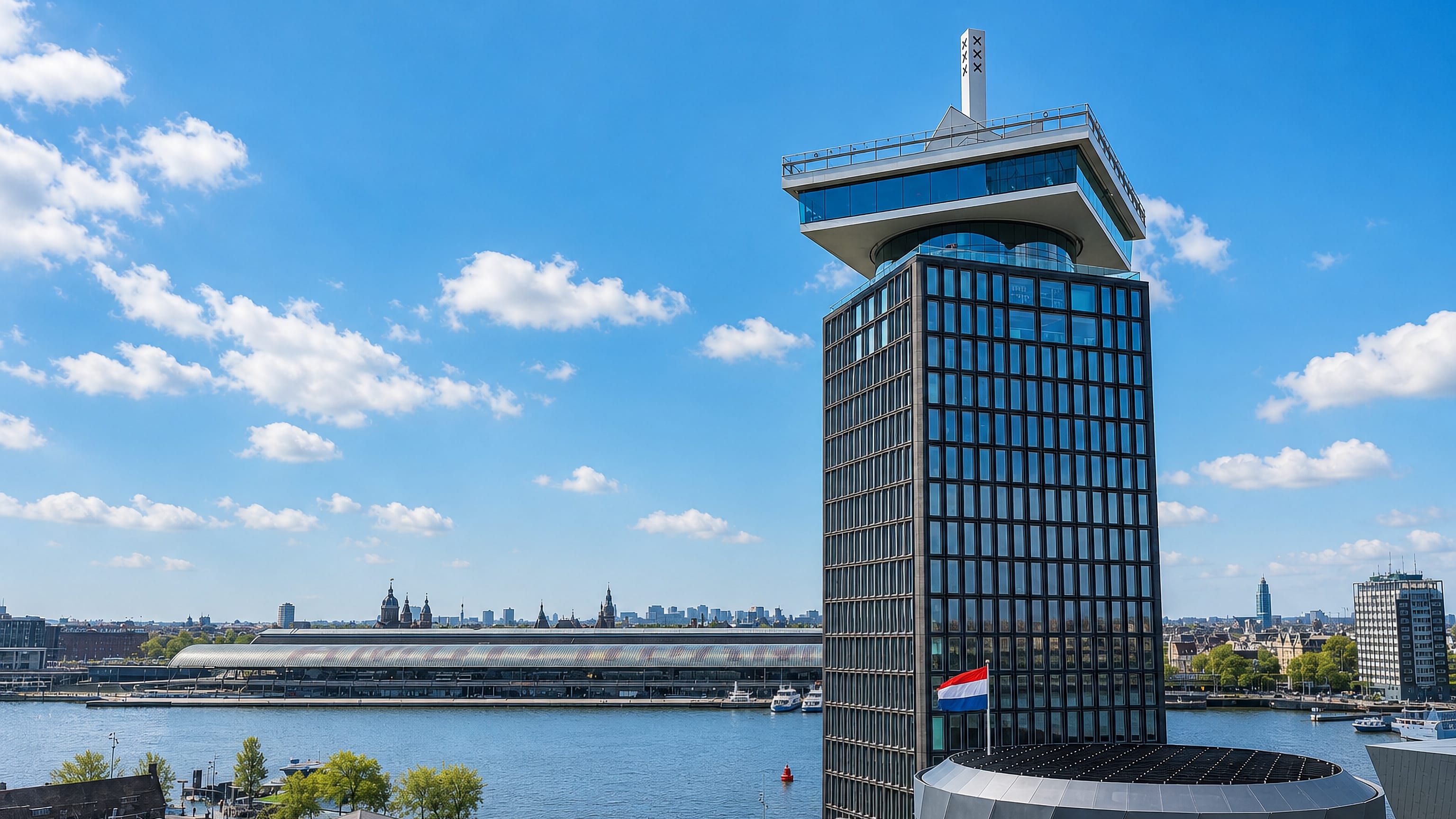 The A'DAM Tower on the IJ waterfront in Amsterdam-Noord, with the city skyline across the water