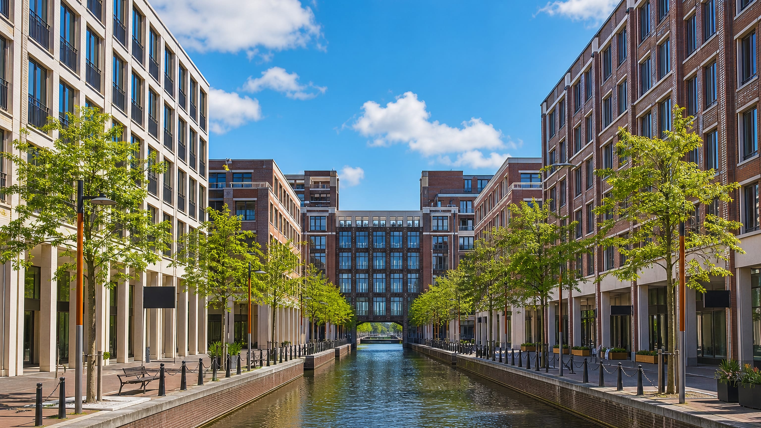 Modern brick apartment blocks lining a straight canal in Leidsche Rijn, Utrecht's newest district.