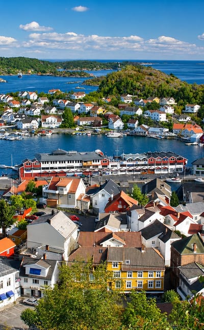 Panoramic view over Kragerø's white timber houses, harbour and archipelago islands on the Telemark coast, Norway.