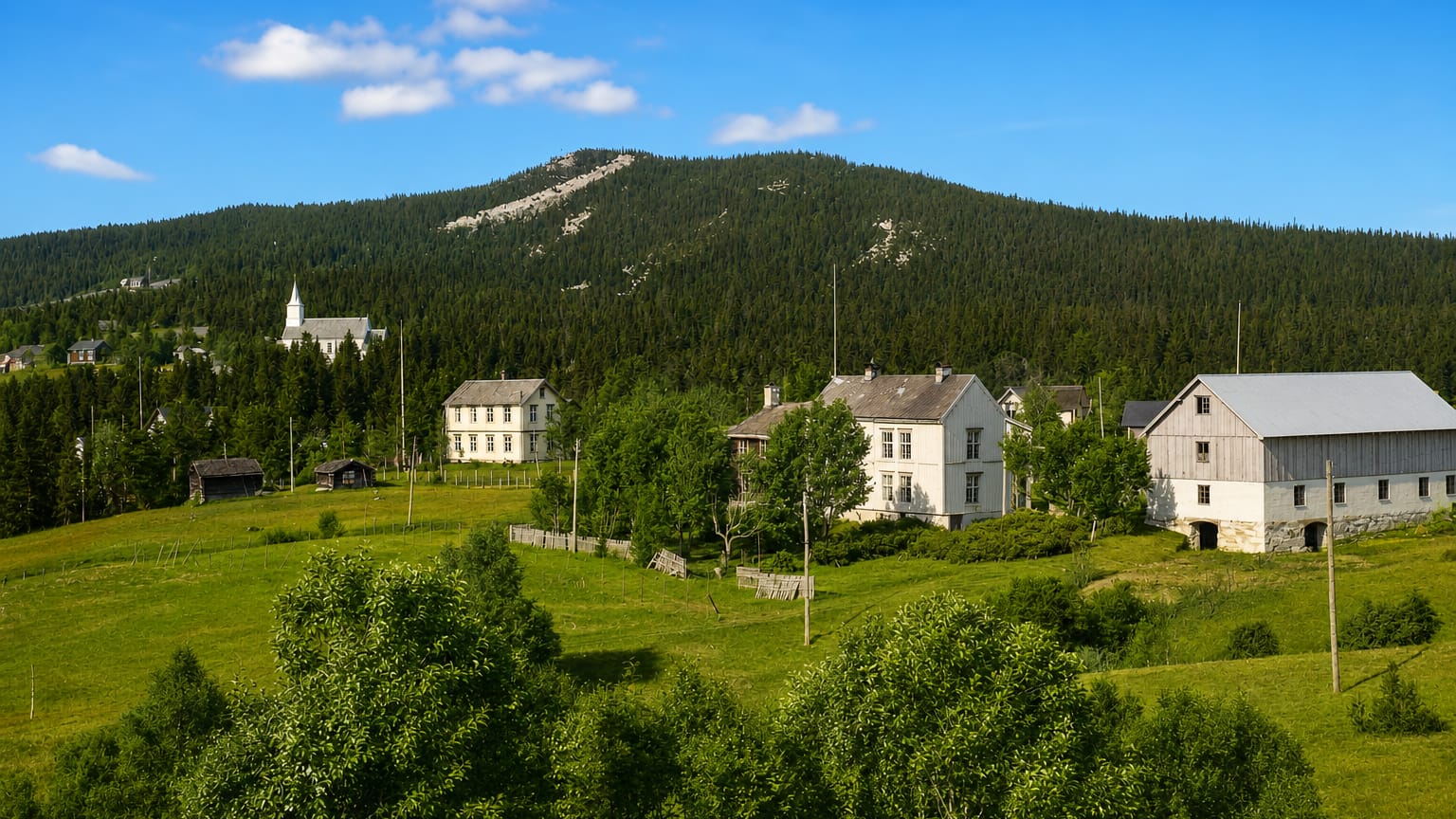 Whitewashed wooden farmhouses and a steepled white church among green pastures below forested hills in Berkåk, Norway.