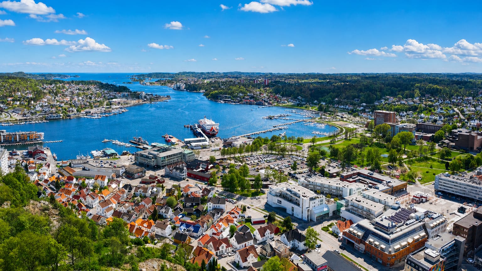 Aerial view of Sandefjord, Norway, with its harbour, ferries, marina and town along the fjord