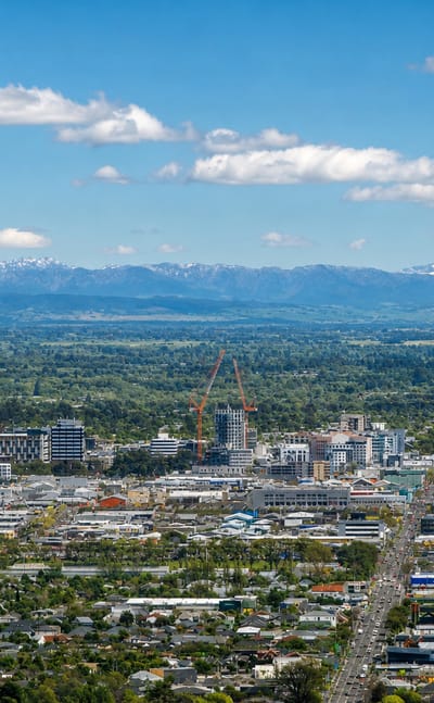 Christchurch spreads across the Canterbury plains below the snow-capped Southern Alps.