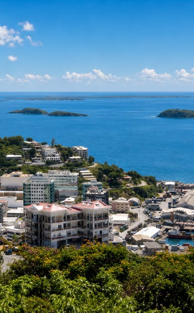 Hillside town overlooking the harbour, port and island-dotted sea at Port Moresby, Papua New Guinea