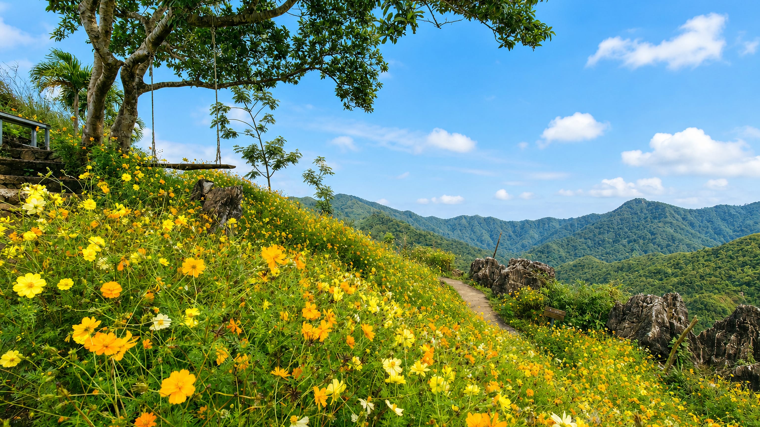 A flowering hillside viewpoint above the Sierra Madre ridges at Tanay, Rizal, in the Philippines.