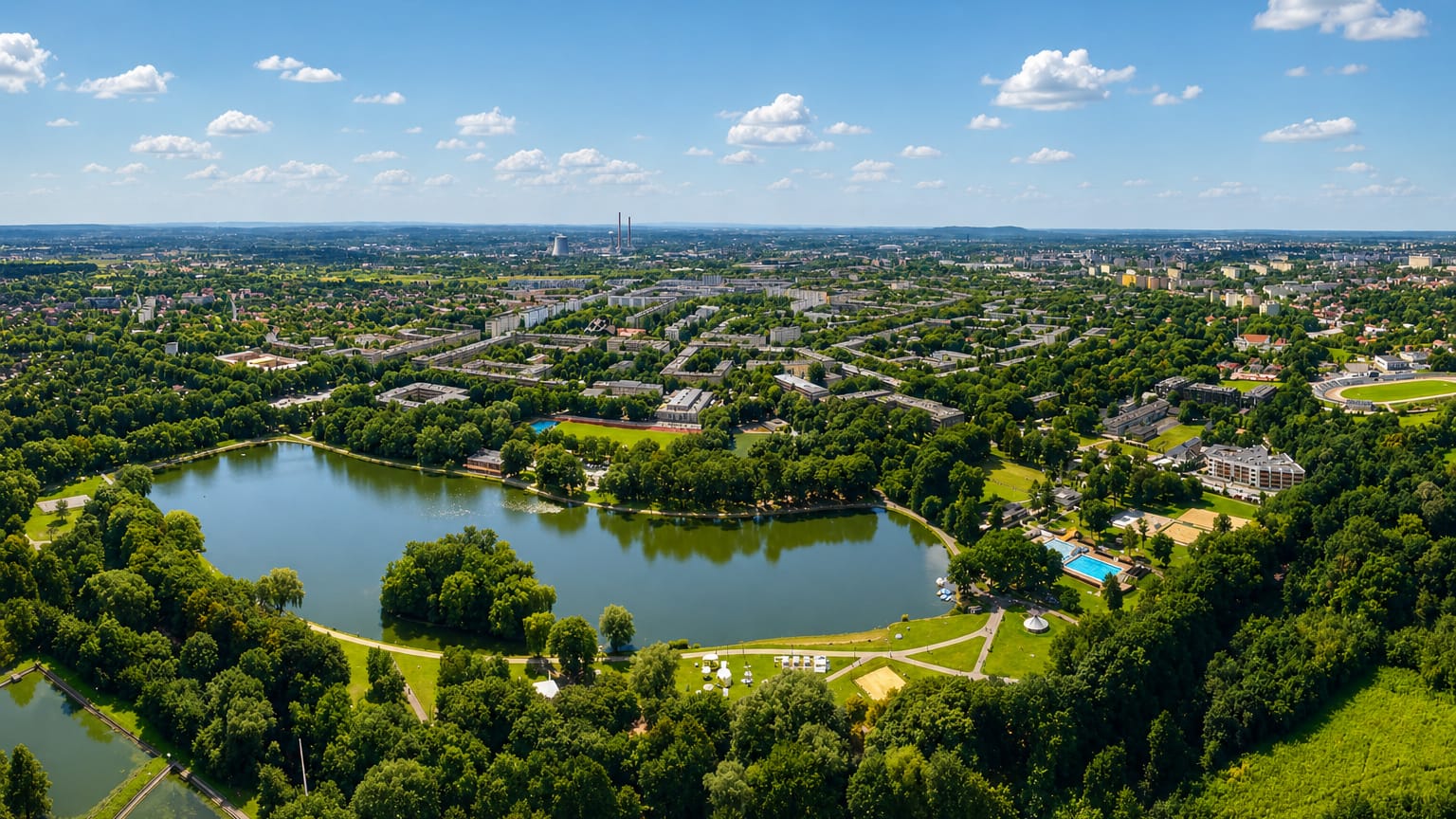 Aerial view of the Nowa Huta district of Krakow with its lagoon, parkland and planned housing blocks