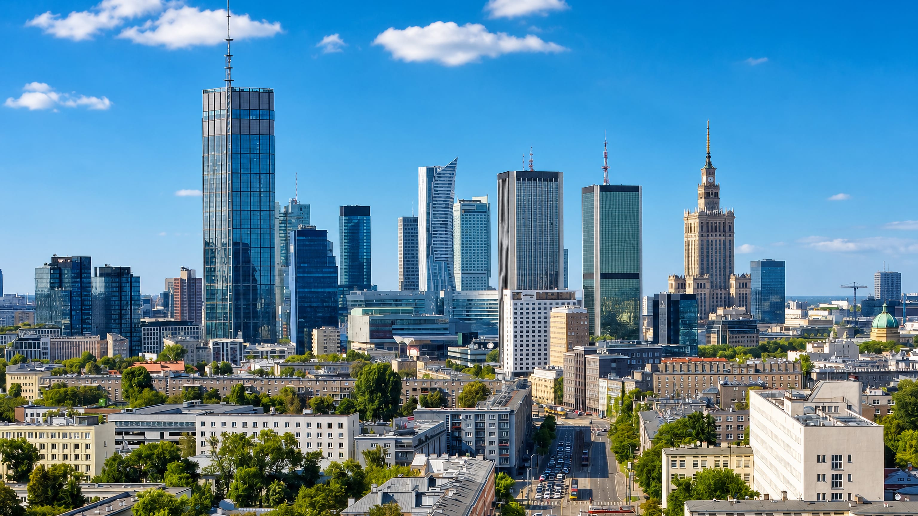Warsaw's Sródmiescie skyline with the Palace of Culture and Science standing among glass office towers.