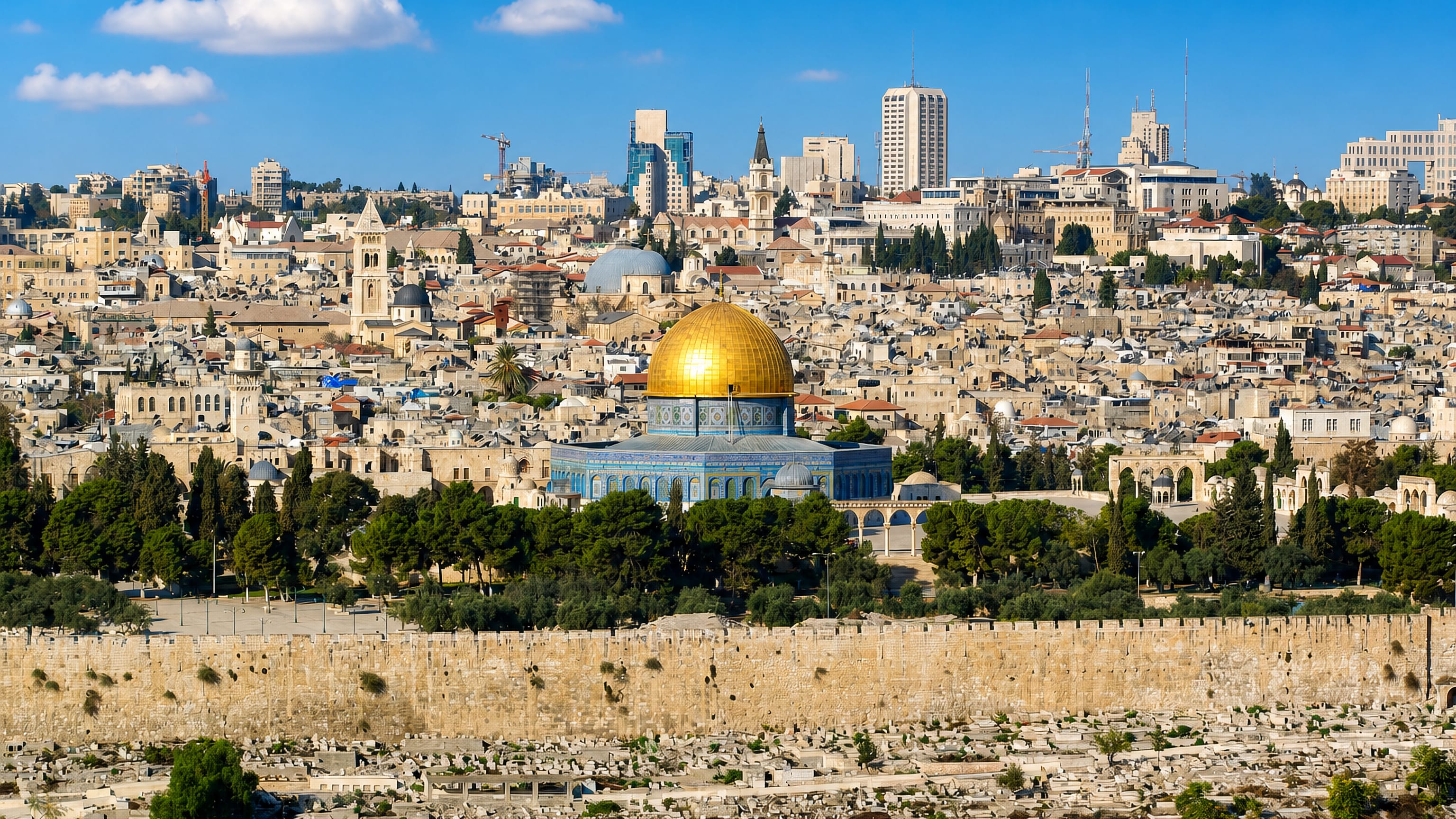 East Jerusalem's Old City from the Mount of Olives, the golden Dome of the Rock rising above the Temple Mount wall.