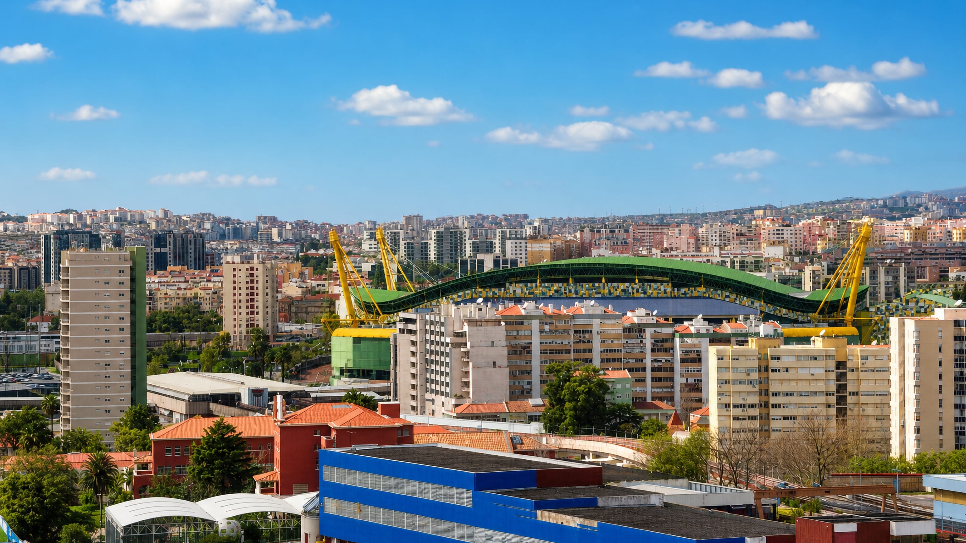 The green roof of Estadio Jose Alvalade rising above apartment blocks in Alvalade, Lisbon