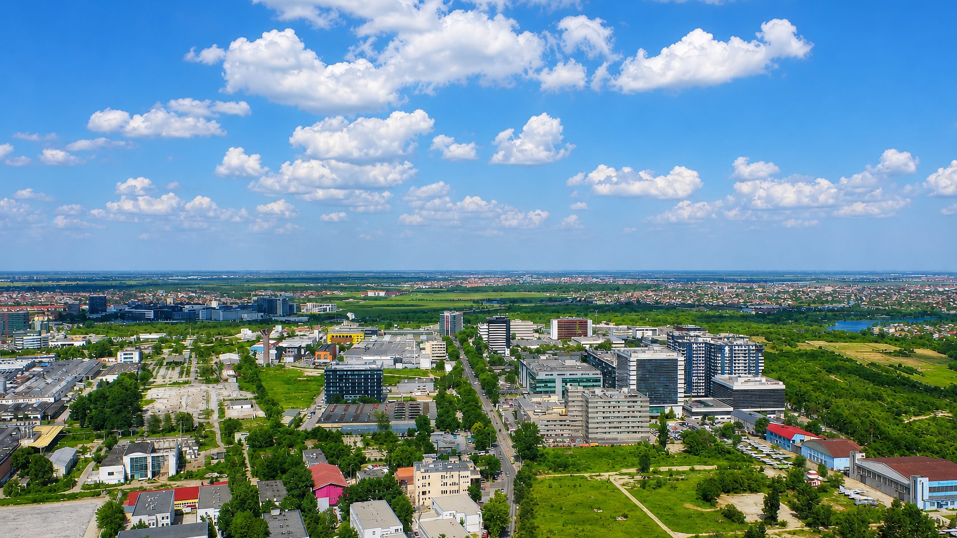 Aerial view over office blocks, low-rise buildings and open plots in Sector 2, Bucharest