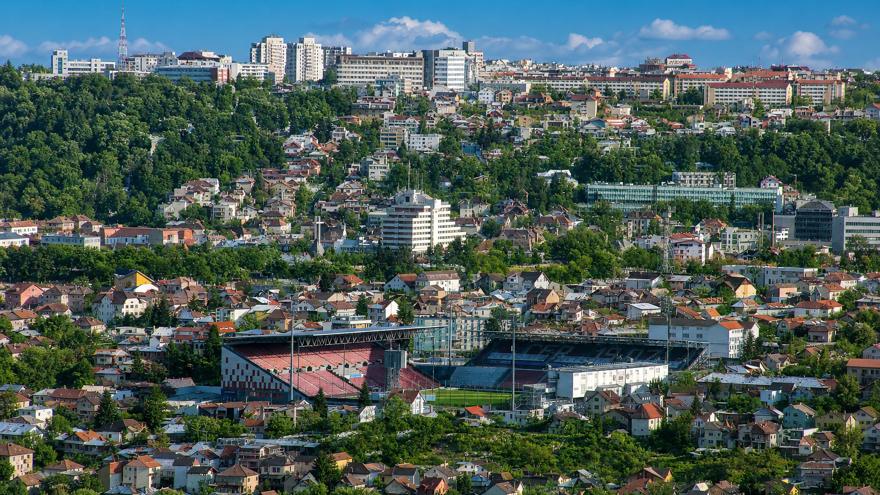 Gruia in Cluj-Napoca, its hillside houses ringing the Dr. Constantin Rădulescu stadium below the city's ridge.