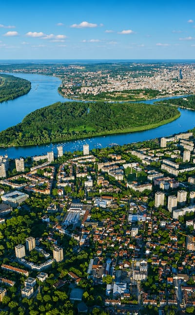 Aerial view of Belgrade at the wooded confluence of the Sava and Danube rivers with the Great War Island