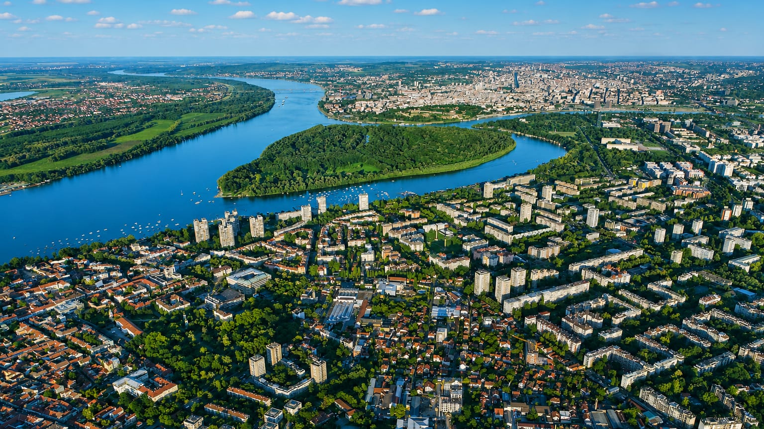 Aerial view of Belgrade at the wooded confluence of the Sava and Danube rivers with the Great War Island