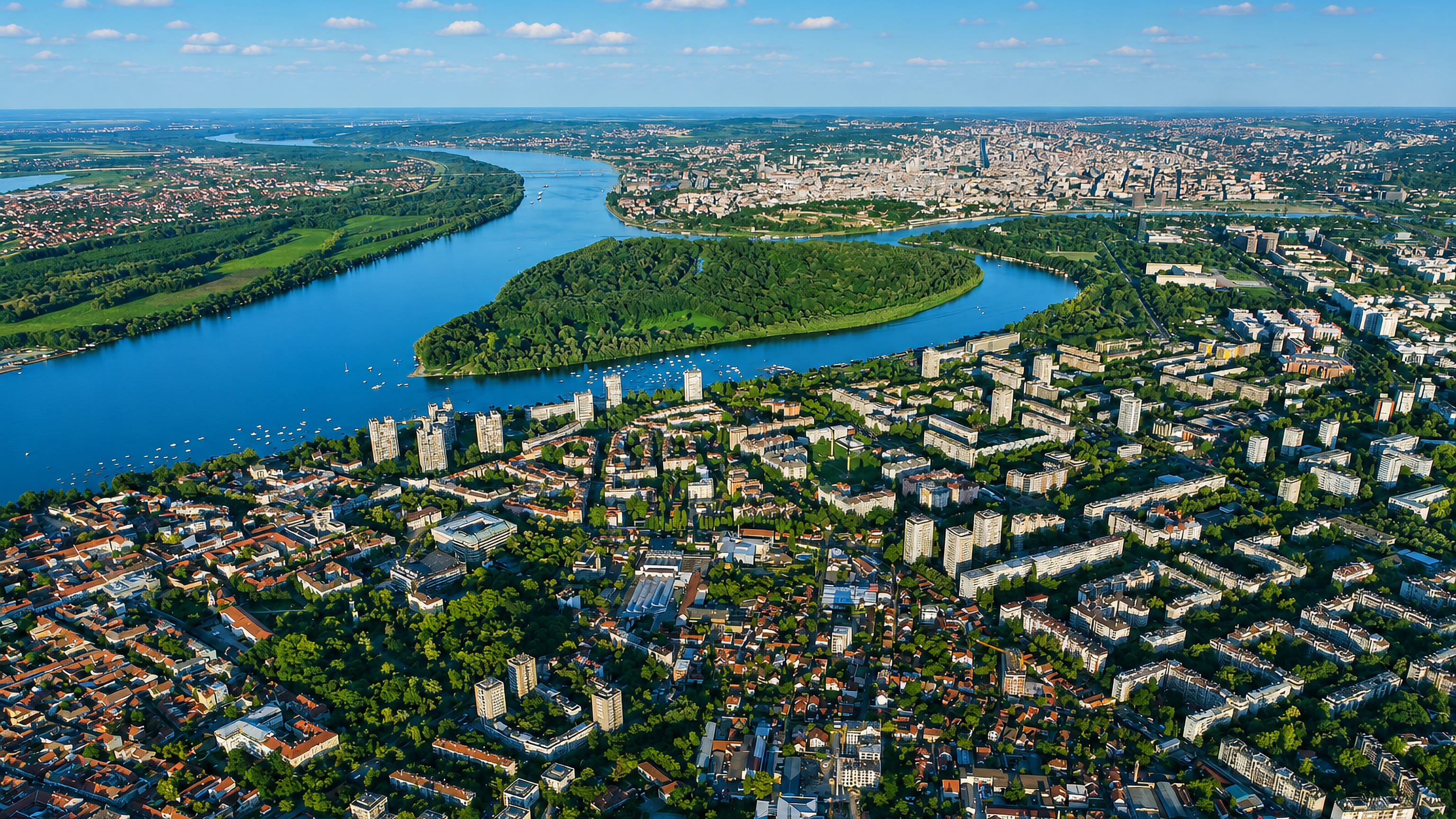 Aerial view of Belgrade at the wooded confluence of the Sava and Danube rivers with the Great War Island