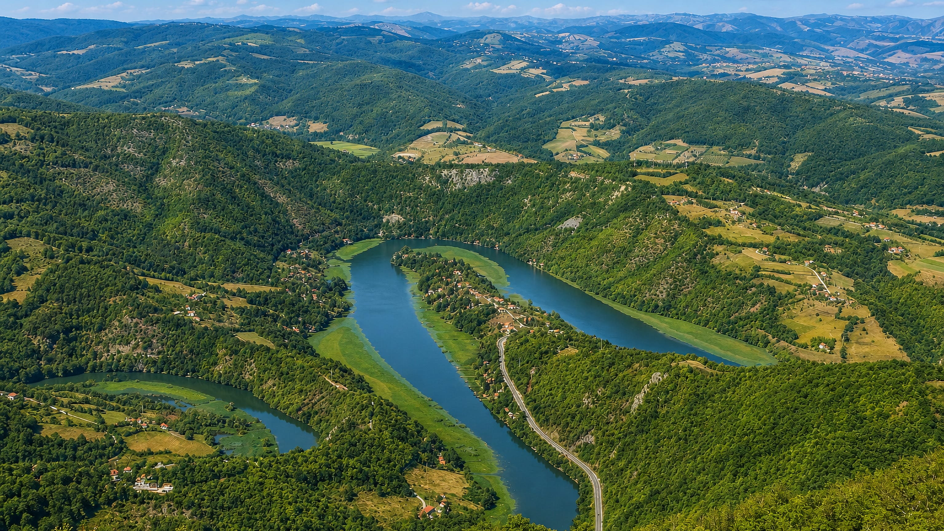 The West Morava meanders through wooded hills of the Ovcar-Kablar gorge near Cacak, Serbia.