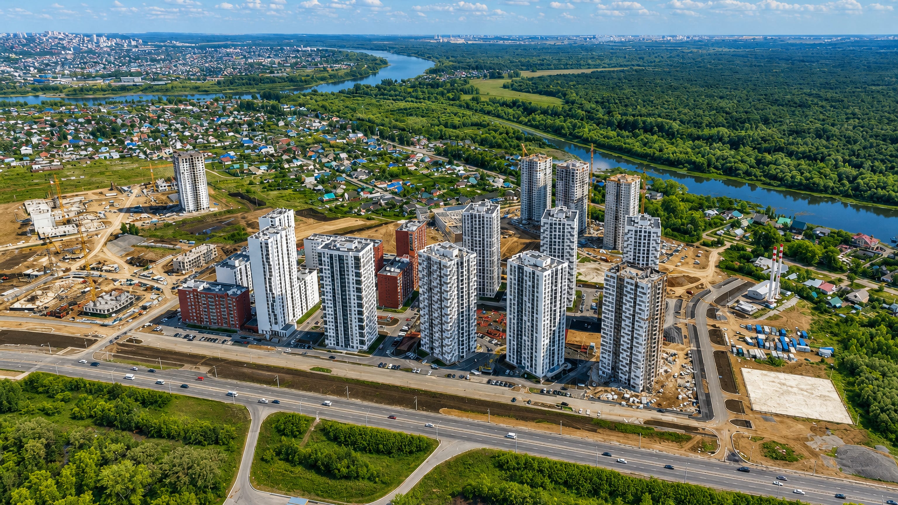 Aerial view of new high-rise housing beside the river and forest at Kozarez, Ufa.