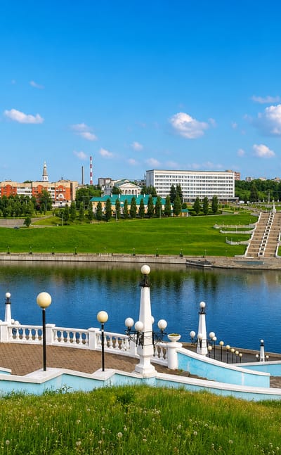 Cheboksary Bay waterfront with a landscaped embankment, fountain terrace and a stepped cascade on the green hill.