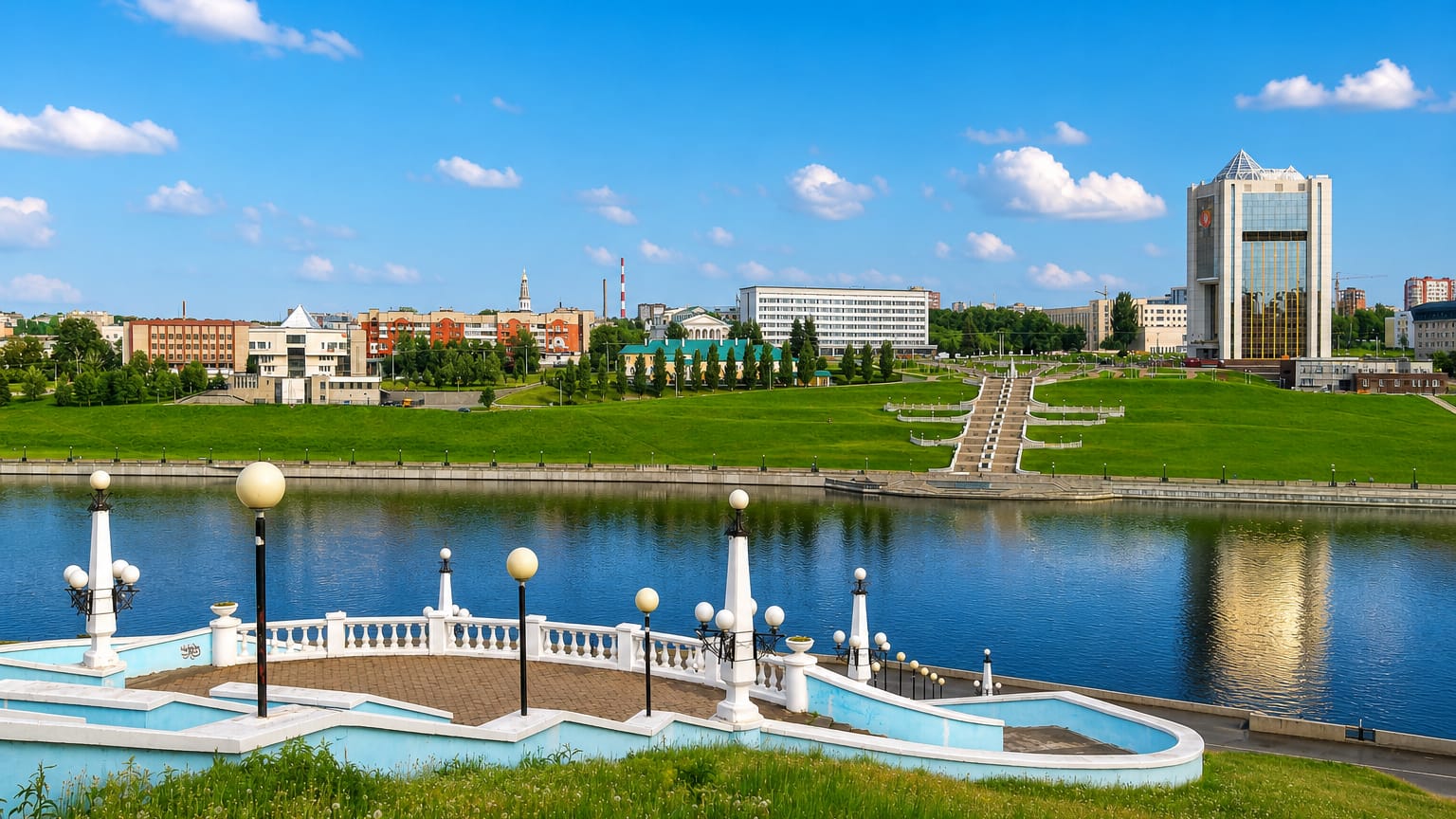 Cheboksary Bay waterfront with a landscaped embankment, fountain terrace and a stepped cascade on the green hill.