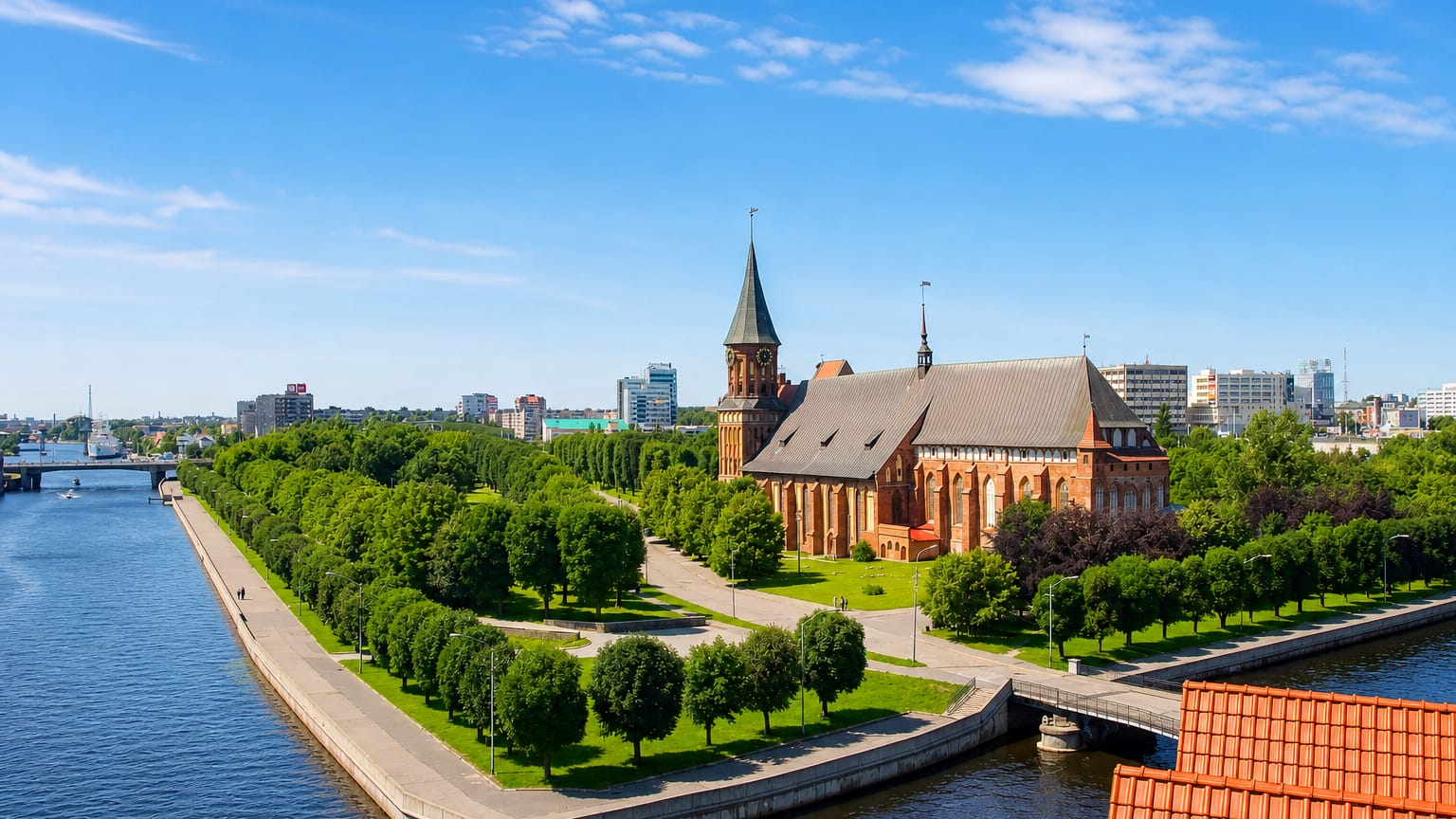 Kaliningrad Cathedral on Kant Island with its Gothic brick tower, surrounded by parkland along the Pregolya River.