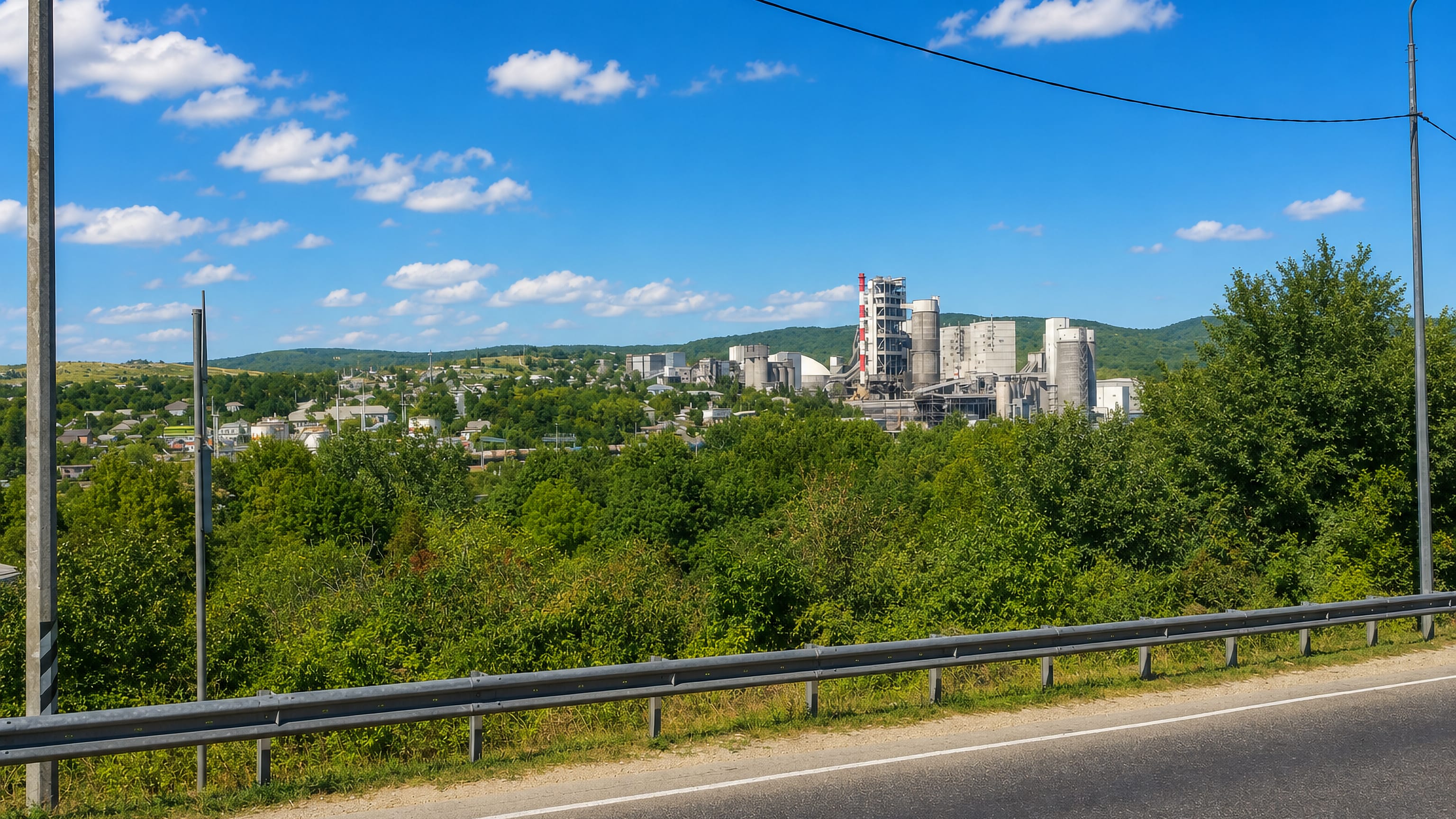 The cement works and wooded hills above the settlement of Verkhnebakanskiy, Krasnodar Krai.