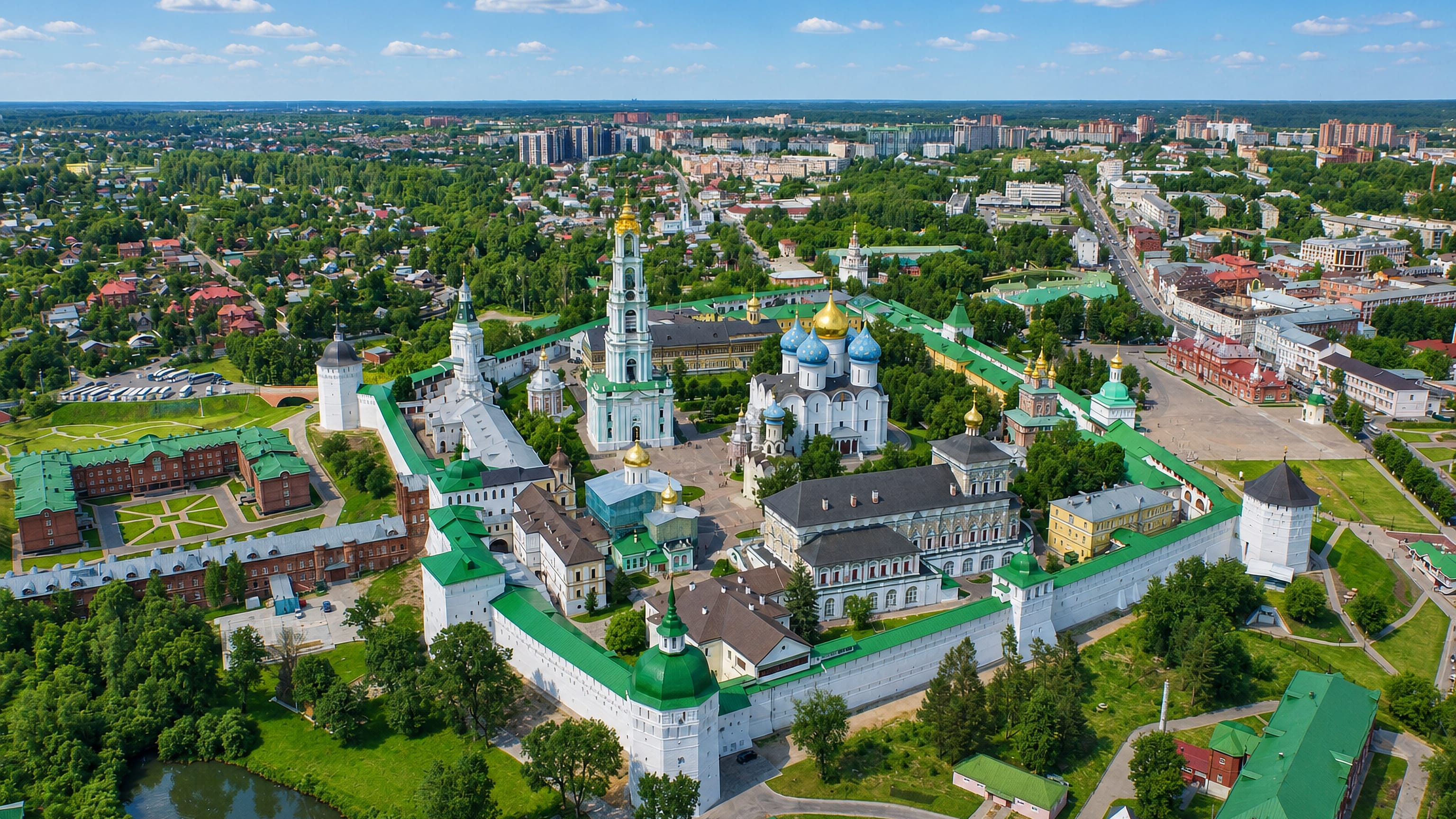 Aerial view of the walled Trinity Lavra of St Sergius and its blue and gold domes above Sergiyev Posad, Russia.