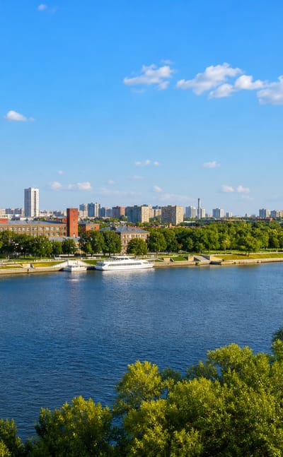 Wide Moskva River skyline with a golden-domed church, riverboats and the Ostankino Tower on the horizon, Ochakovo-Matveyevskoye, Moscow