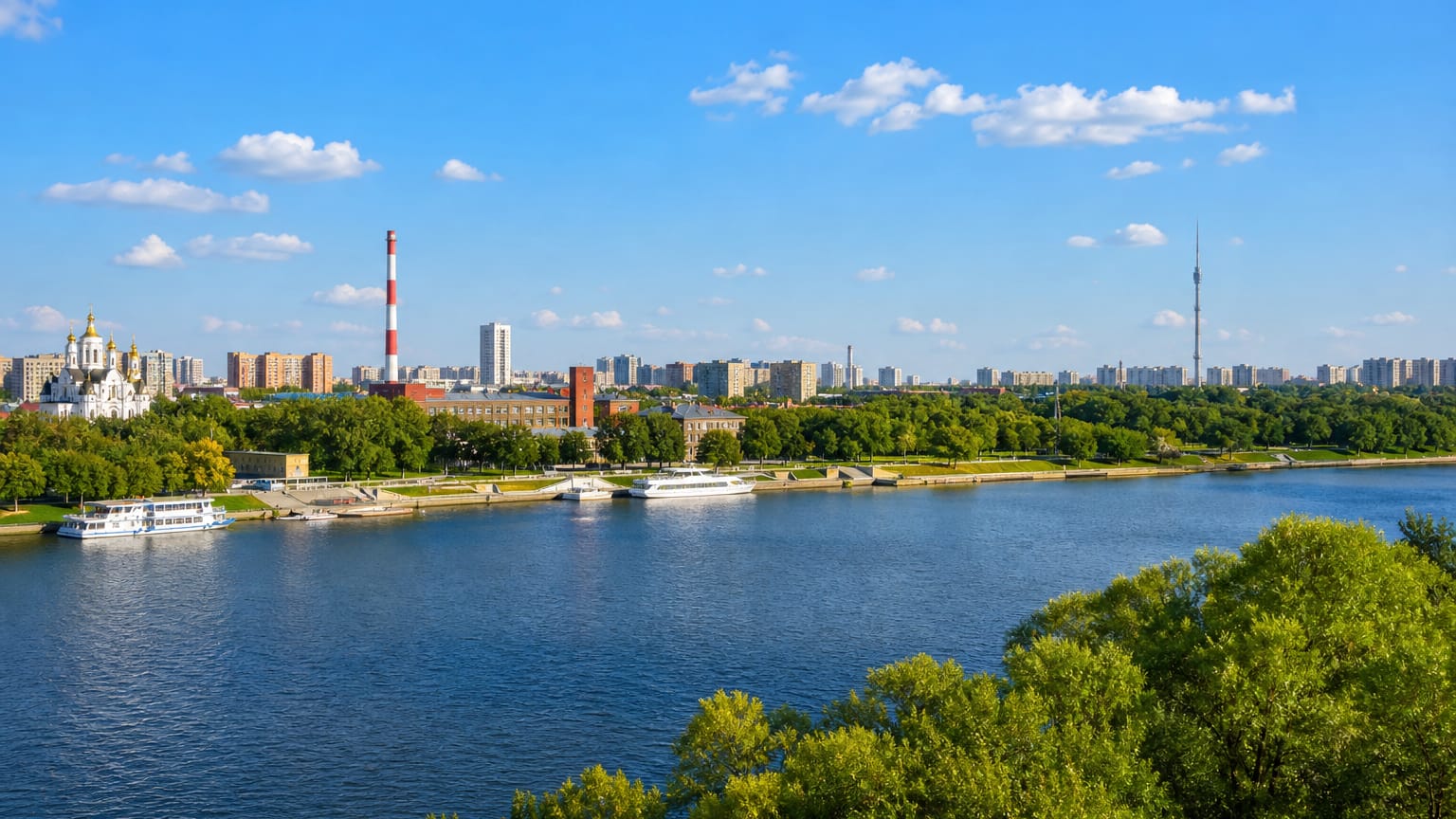 Wide Moskva River skyline with a golden-domed church, riverboats and the Ostankino Tower on the horizon, Ochakovo-Matveyevskoye, Moscow