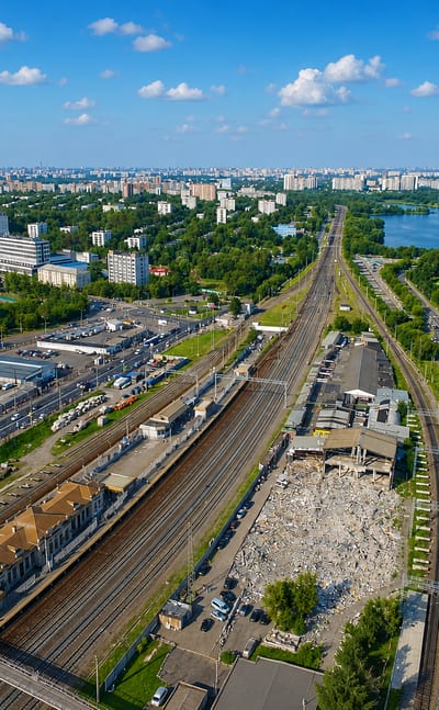 Aerial of railway lines, Soviet-era apartment blocks and ponds in the Tsaritsyno district of Moscow.