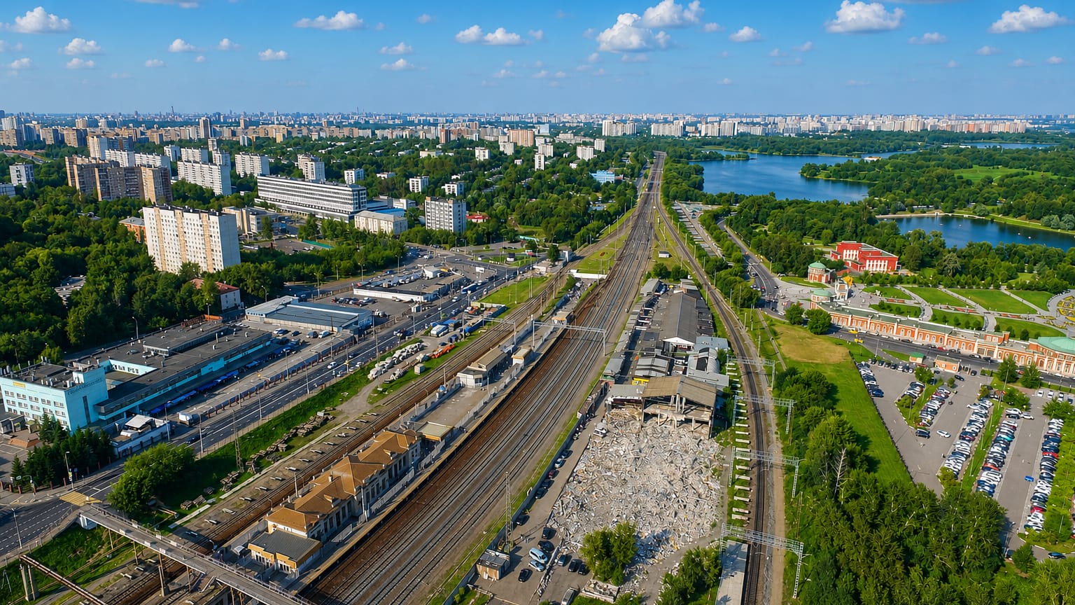 Aerial of railway lines, Soviet-era apartment blocks and ponds in the Tsaritsyno district of Moscow.