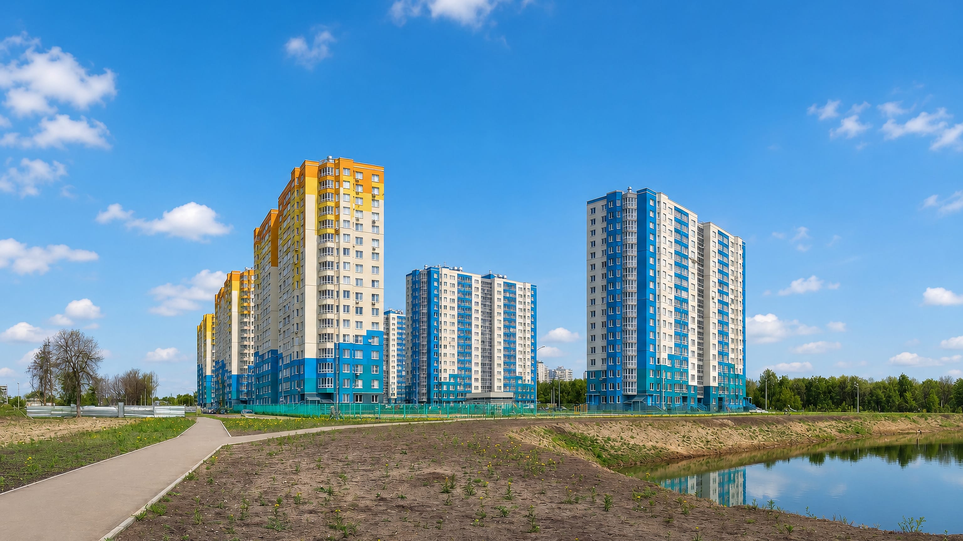 New colourful high-rise apartment towers beside a pond in the Avtozavodsky district of Nizhny Novgorod.