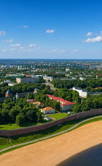 Aerial view of Velikiy Novgorod's red-brick Kremlin walls and towers with St. Sophia Cathedral beside the Volkhov River