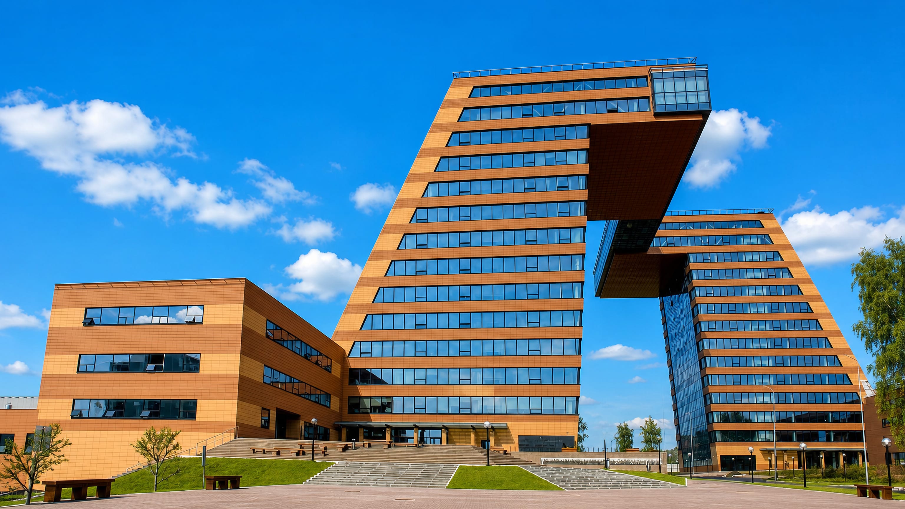Angular modernist university building under a clear blue sky in Akademgorodok, the science town of Novosibirsk, Russia.