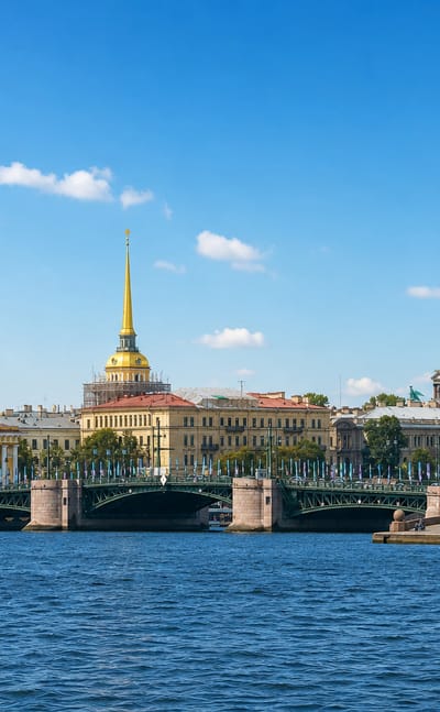 Saint Petersburg skyline over the Neva with St. Isaac's dome, the Admiralty spire and the Rostral Column