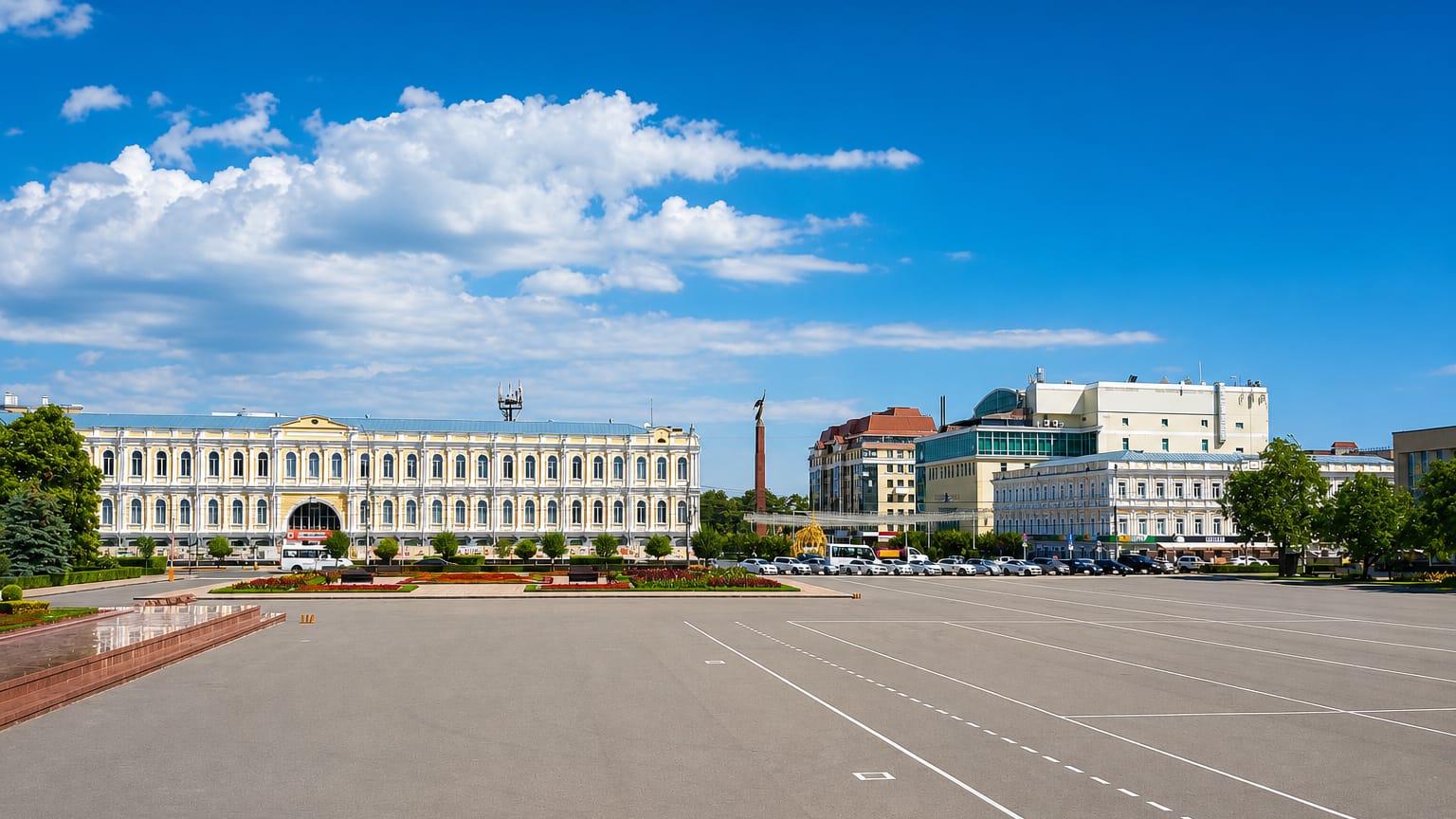 The historic classical building on the broad central Lenin Square in Stavropol, Russia, under a summer sky.