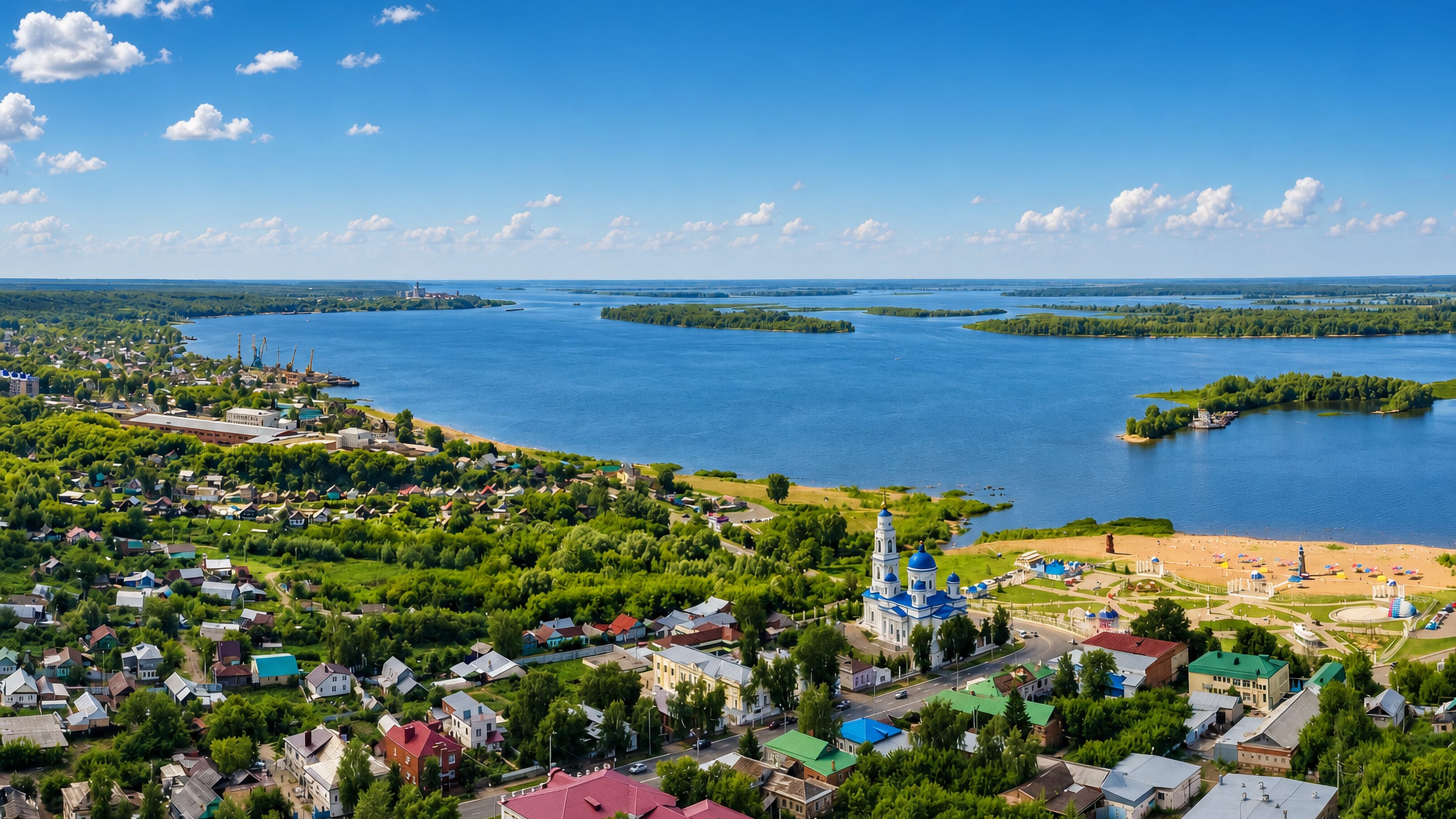 Aerial view of Chistopol, Tatarstan, on the wide Kama river, with a blue-domed cathedral downtown.