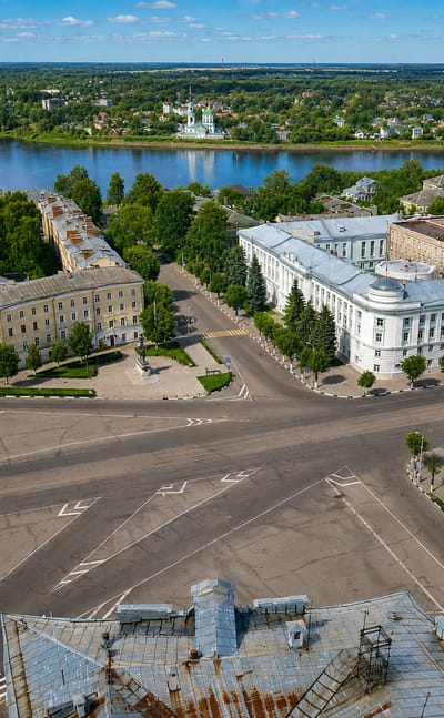 Aerial view of Tver's central square and radiating streets beside the Volga River.