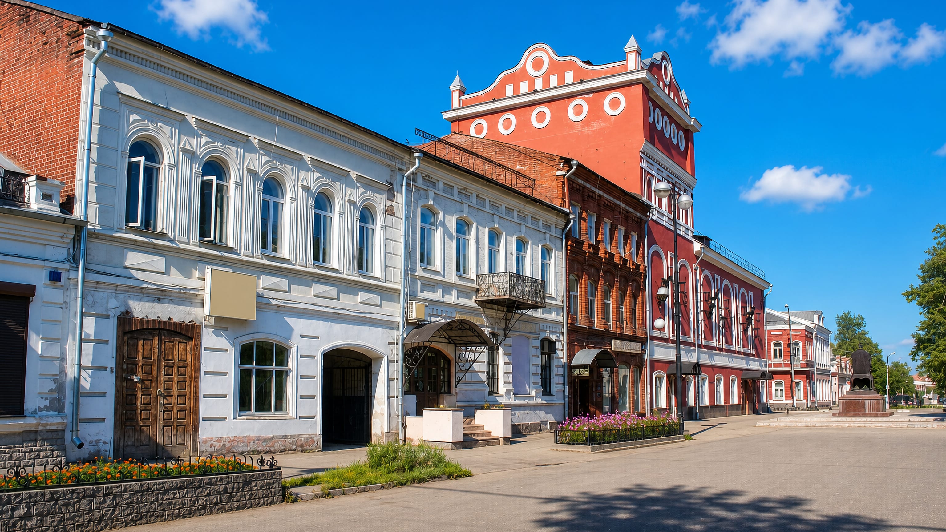 Nineteenth-century merchant buildings lining a quiet street in Vyshniy Volochëk, Russia.